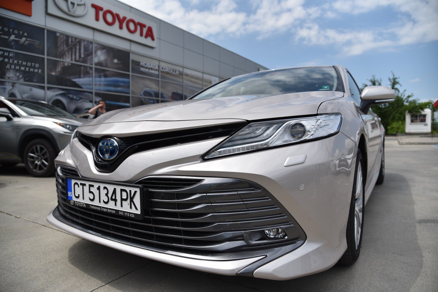 Close-up of front grille and headlights of a modern sedan