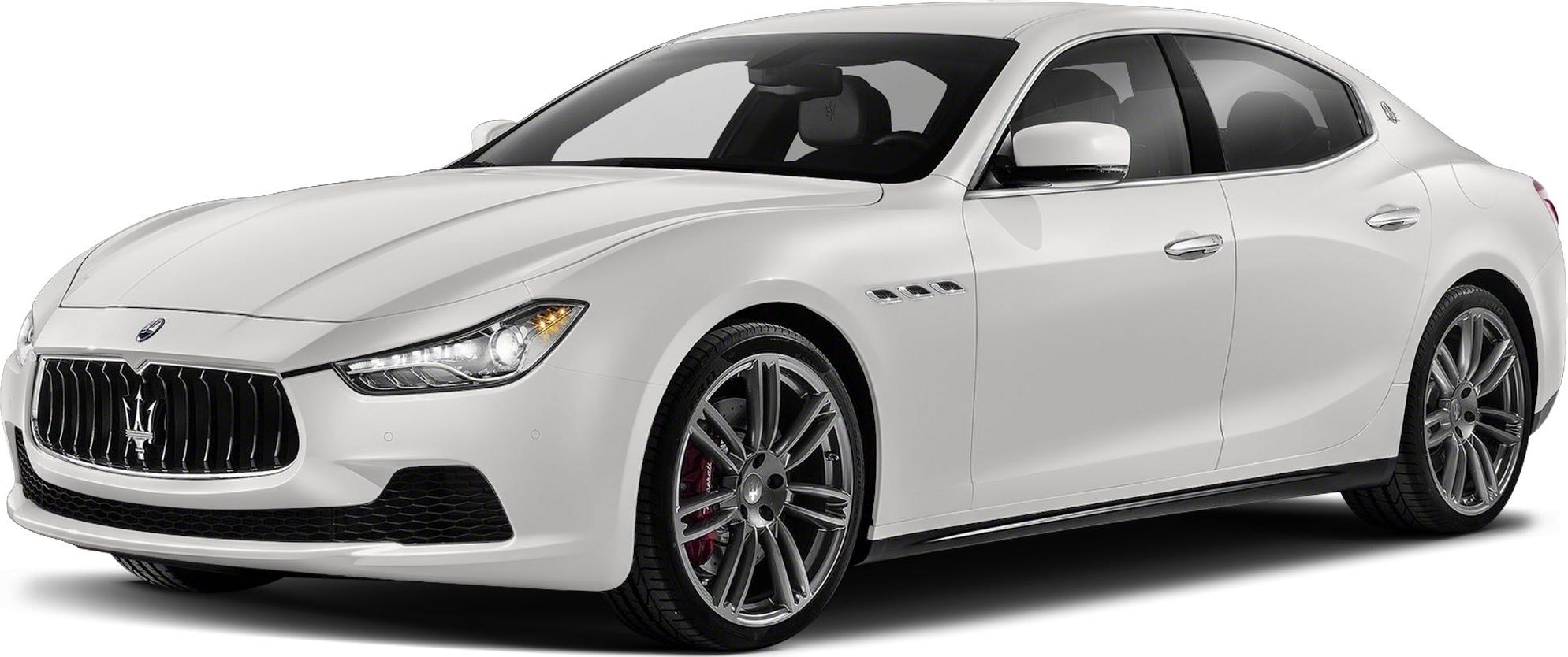 White luxury sedan with prominent front grille and alloy wheels