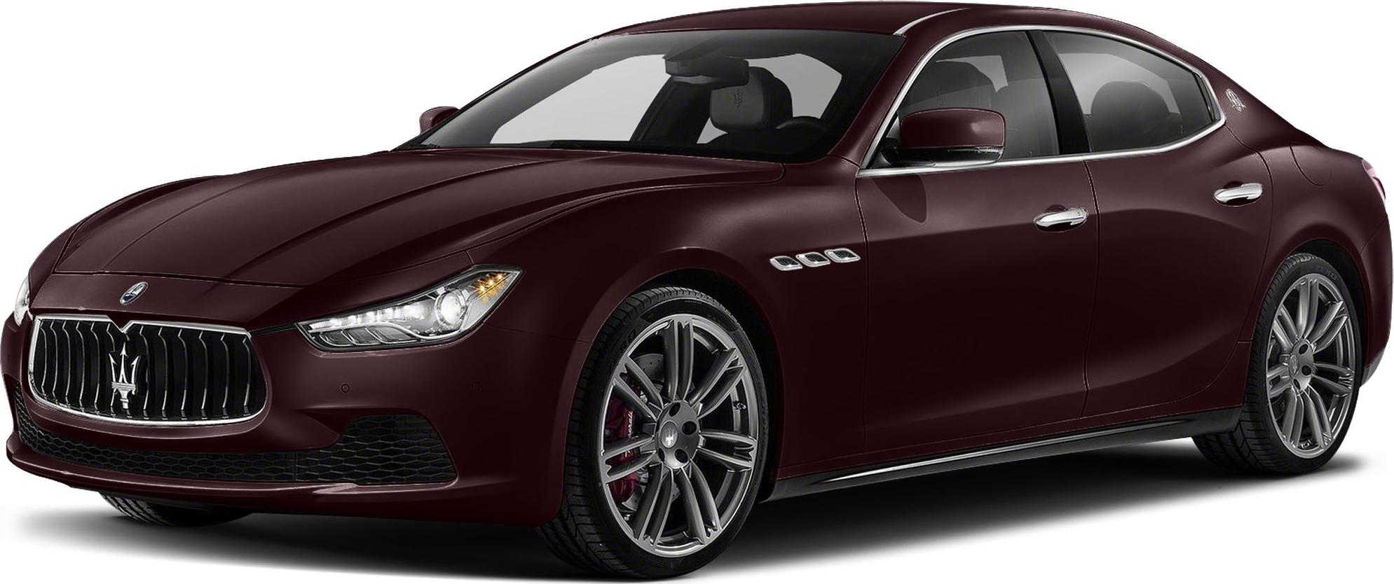 Luxury sedan front side view with prominent grille and alloy wheels