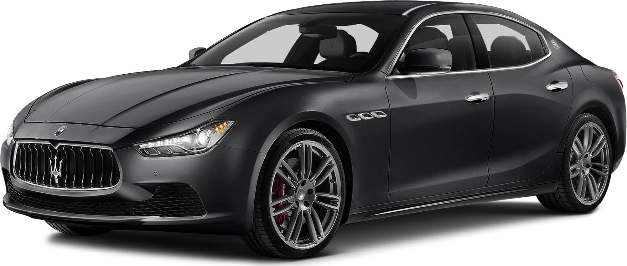 Front-side profile of luxury sedan with aggressive grille and alloy wheels