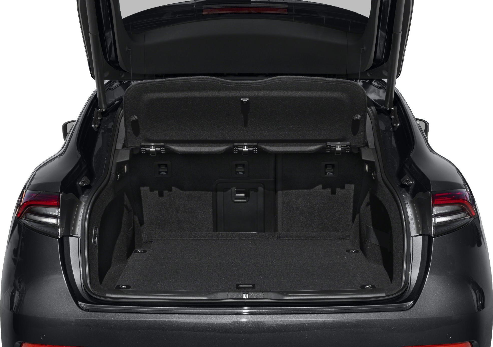 Open trunk with foldable rear seats and cargo cover in SUV