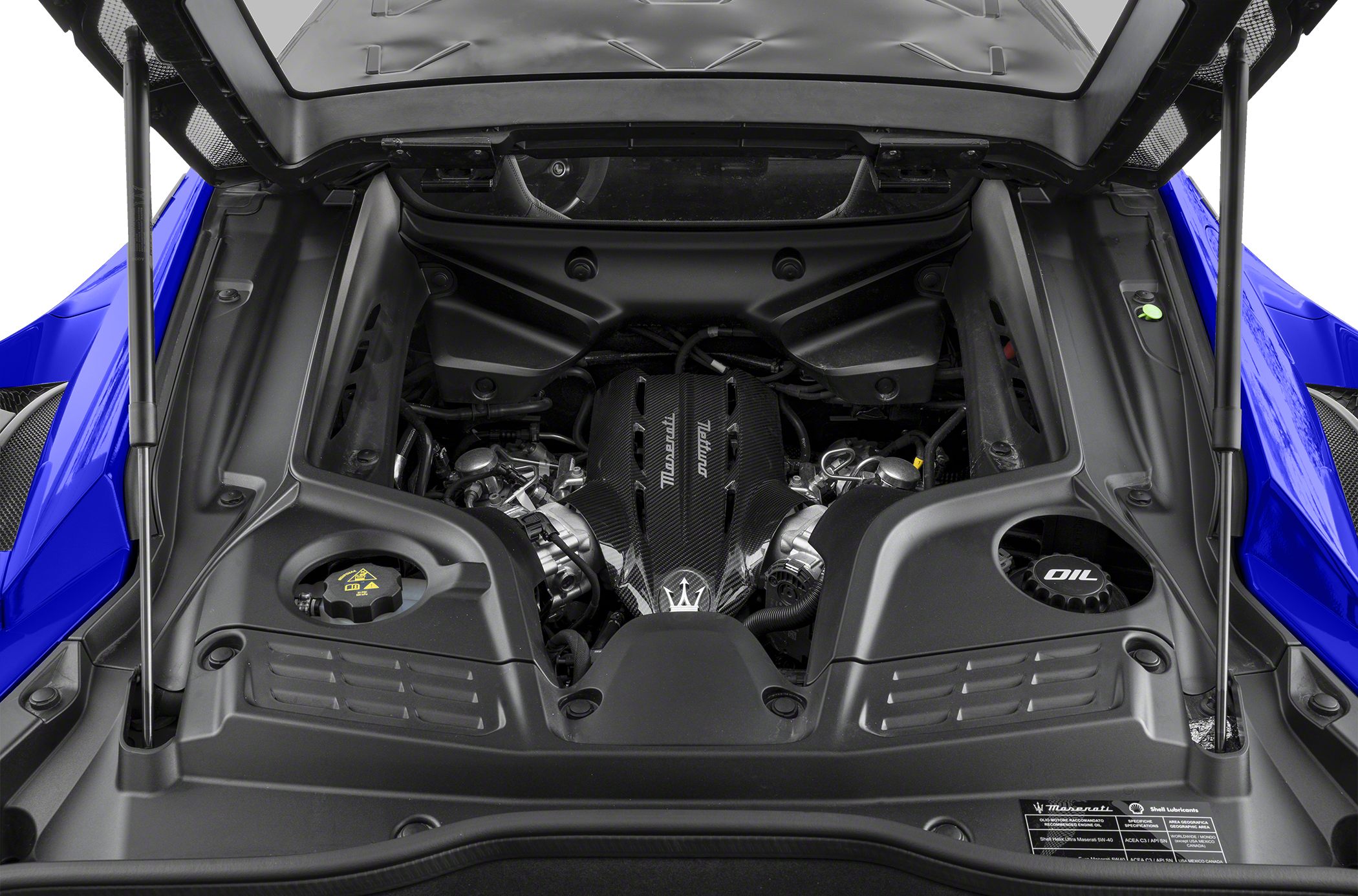Carbon fiber engine cover and detailed Maserati MC20 engine bay.