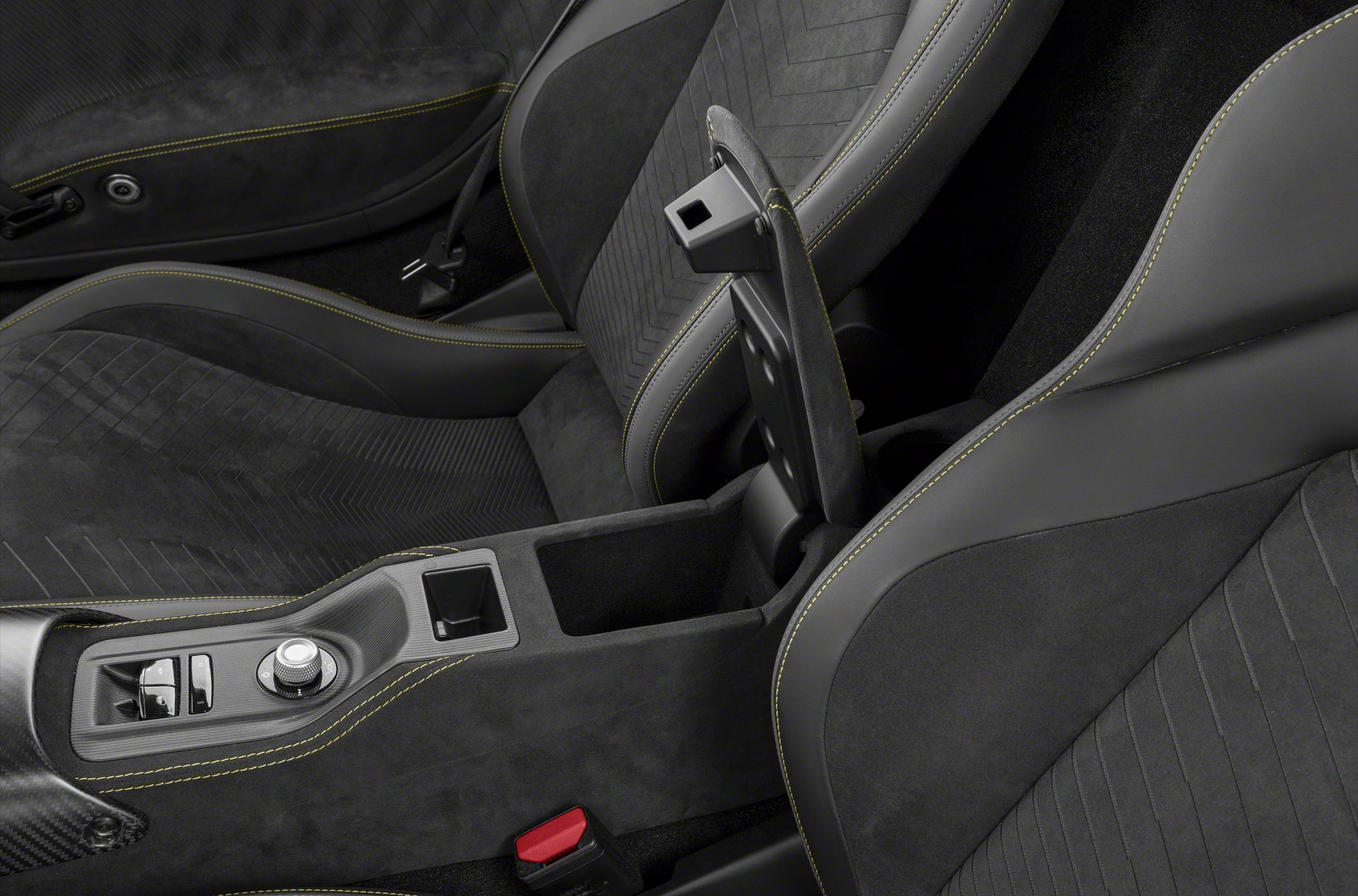 Luxury sports seats with detailed stitching and center console storage