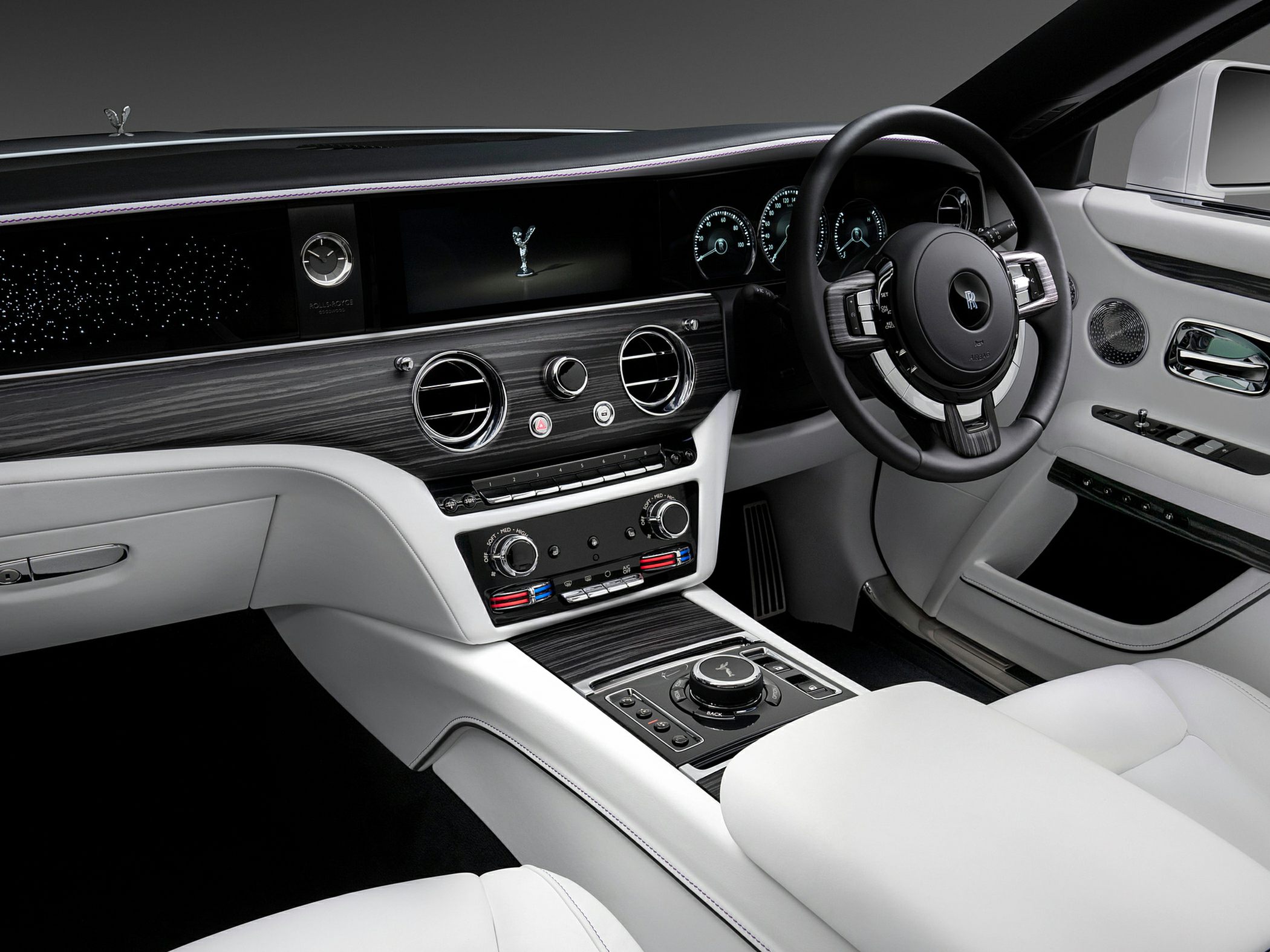 Digital cluster and analog clock with elegant wood trim interior