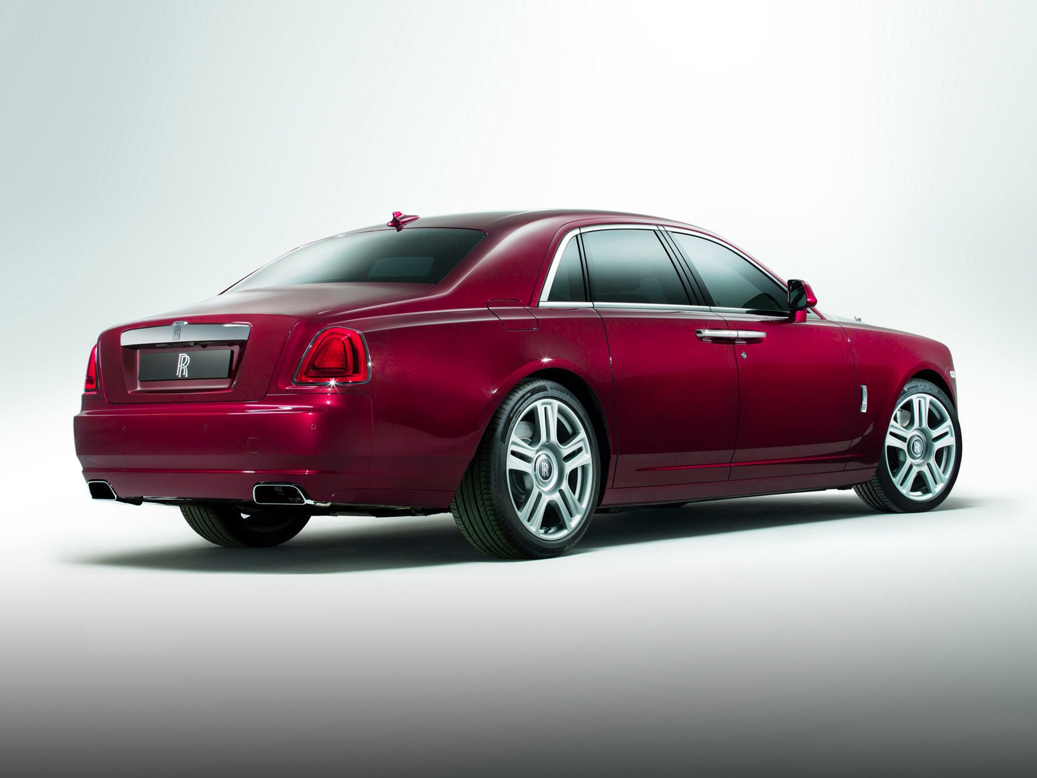 Luxury extended wheelbase sedan rear and side view with distinctive taillights and premium wheels