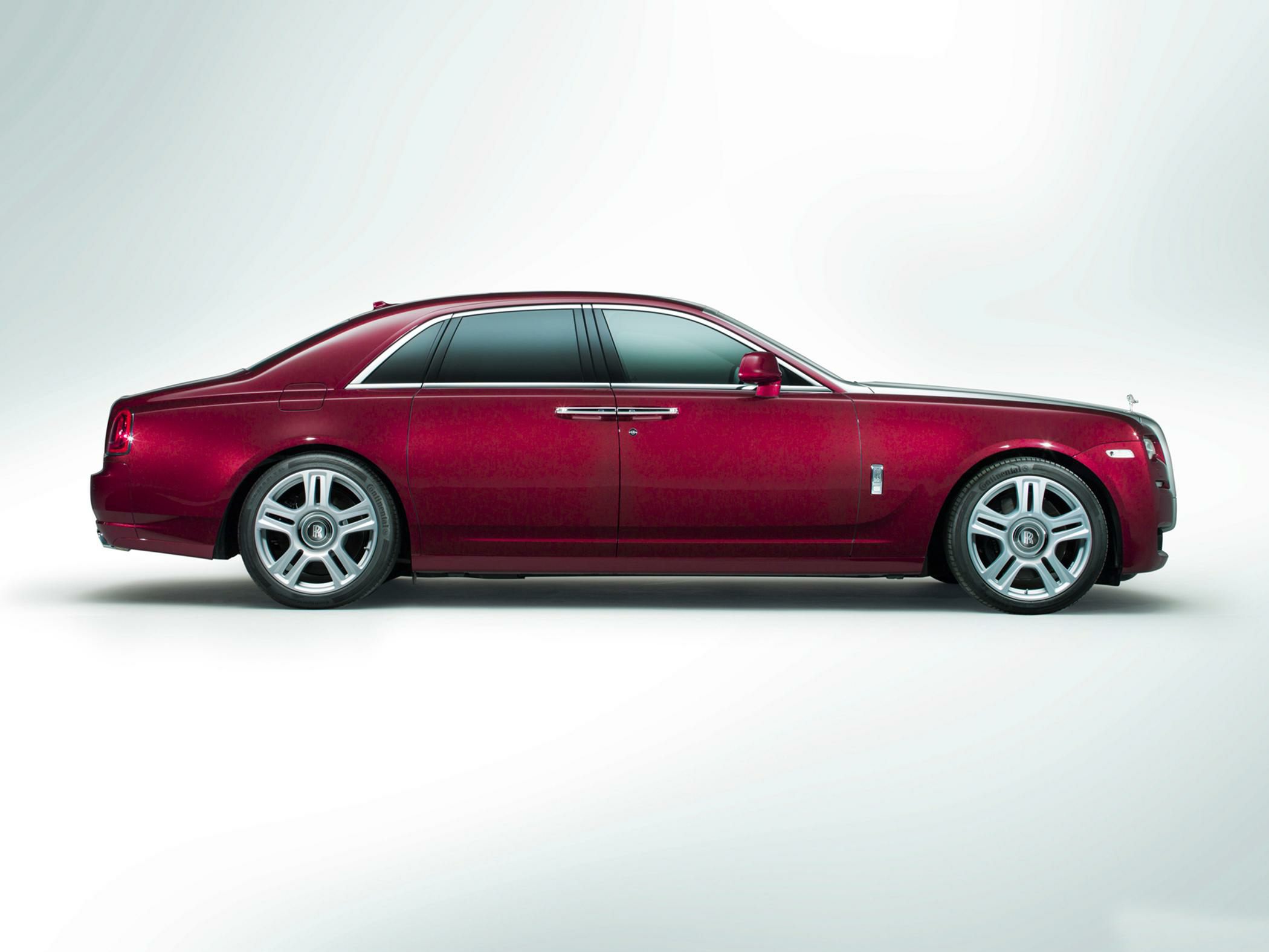 Extended wheelbase luxury sedan side profile with chrome accents and premium wheels