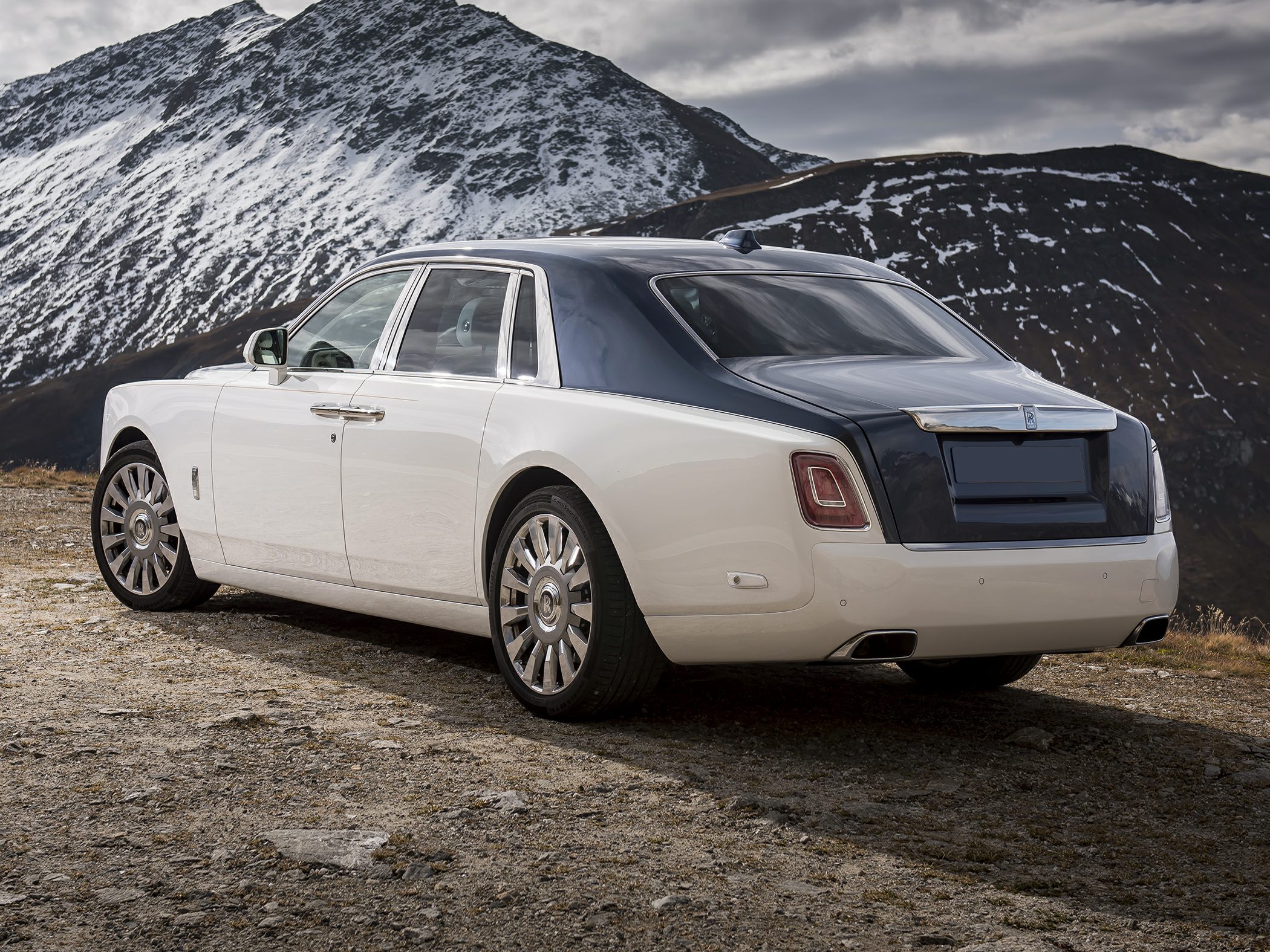 Extended wheelbase luxury sedan with two-tone paint and elegant rear design