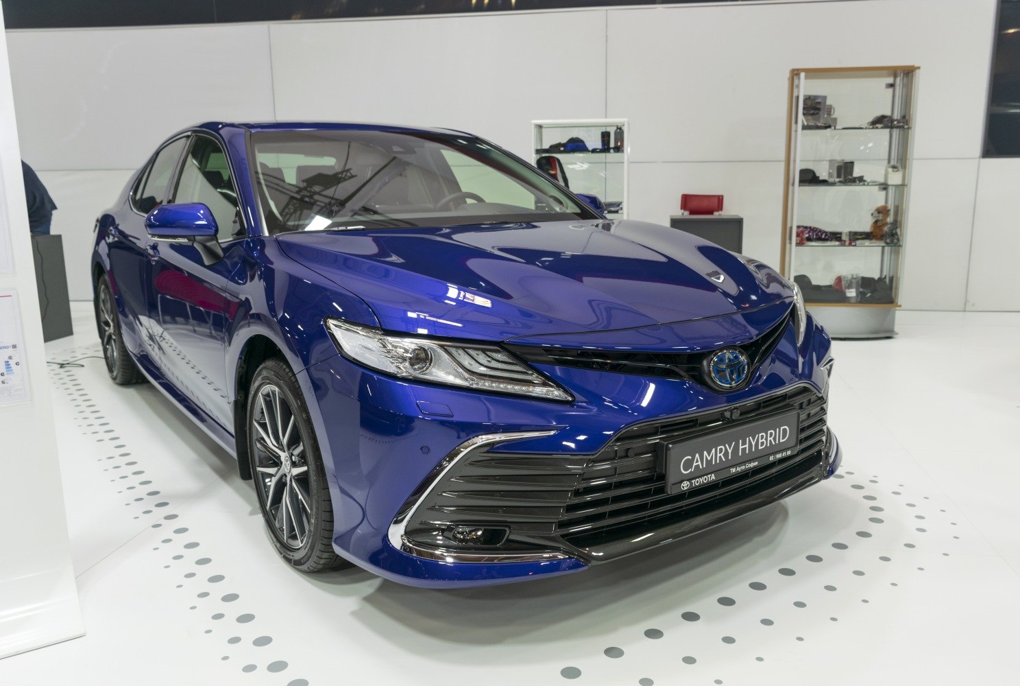 Front exterior and headlight design of a hybrid sedan