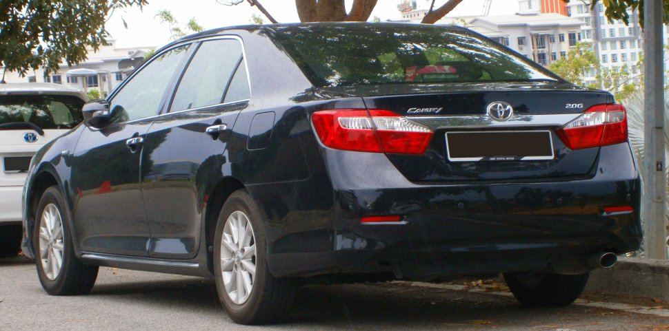 Rear view of mid-size sedan with distinctive tail lights