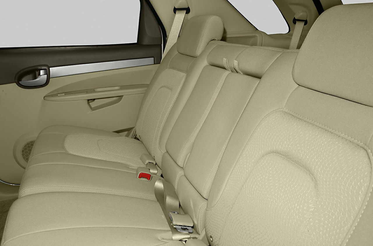 Beige rear seats with seatbelt and upholstery details