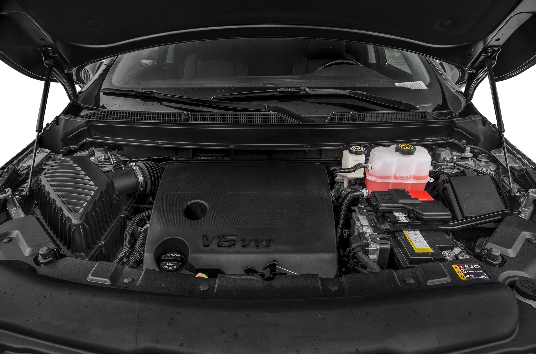 V6 VVT engine bay with air filter, coolant reservoir, and battery