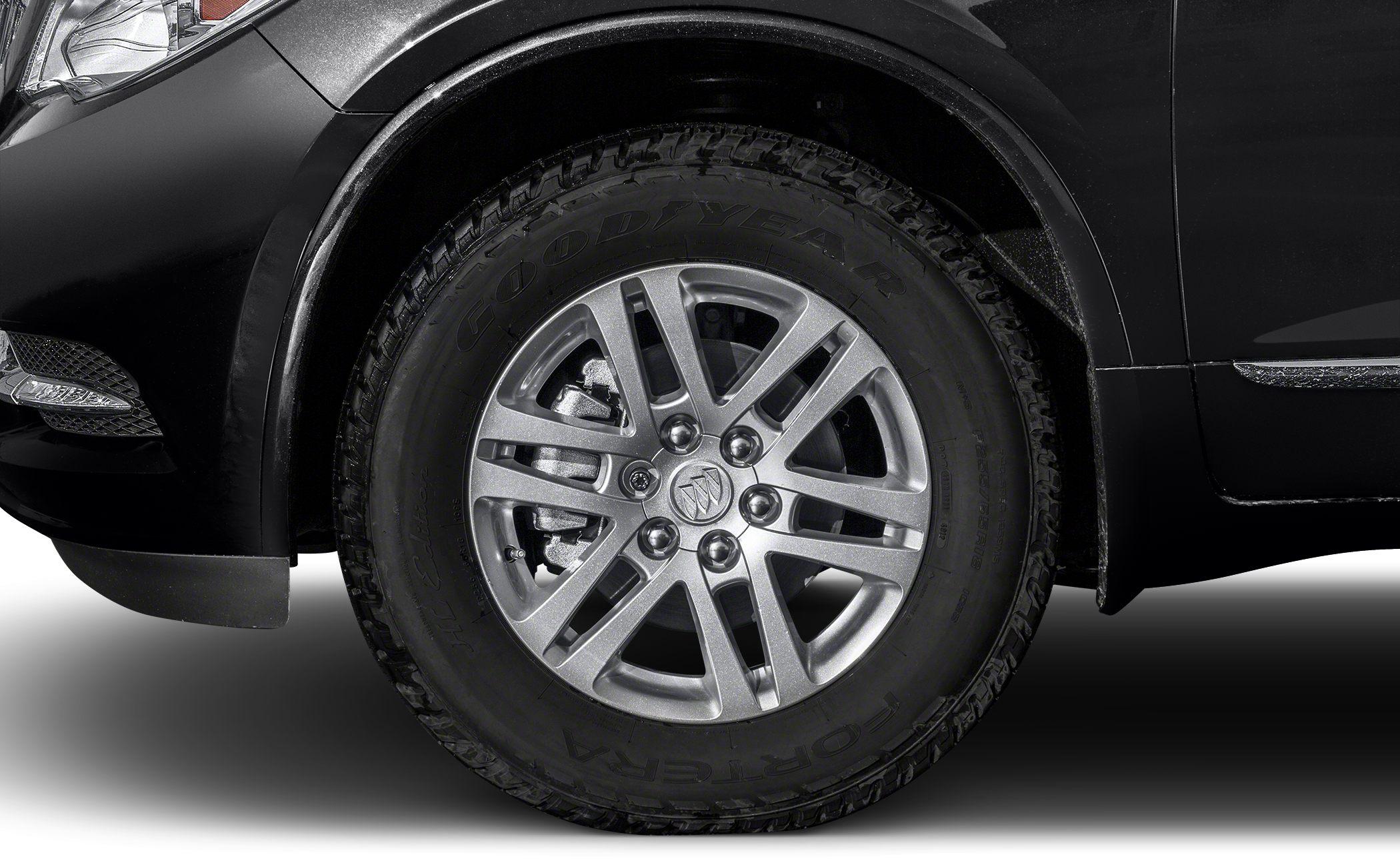Close-up of alloy wheel with Goodyear tire and front fender section