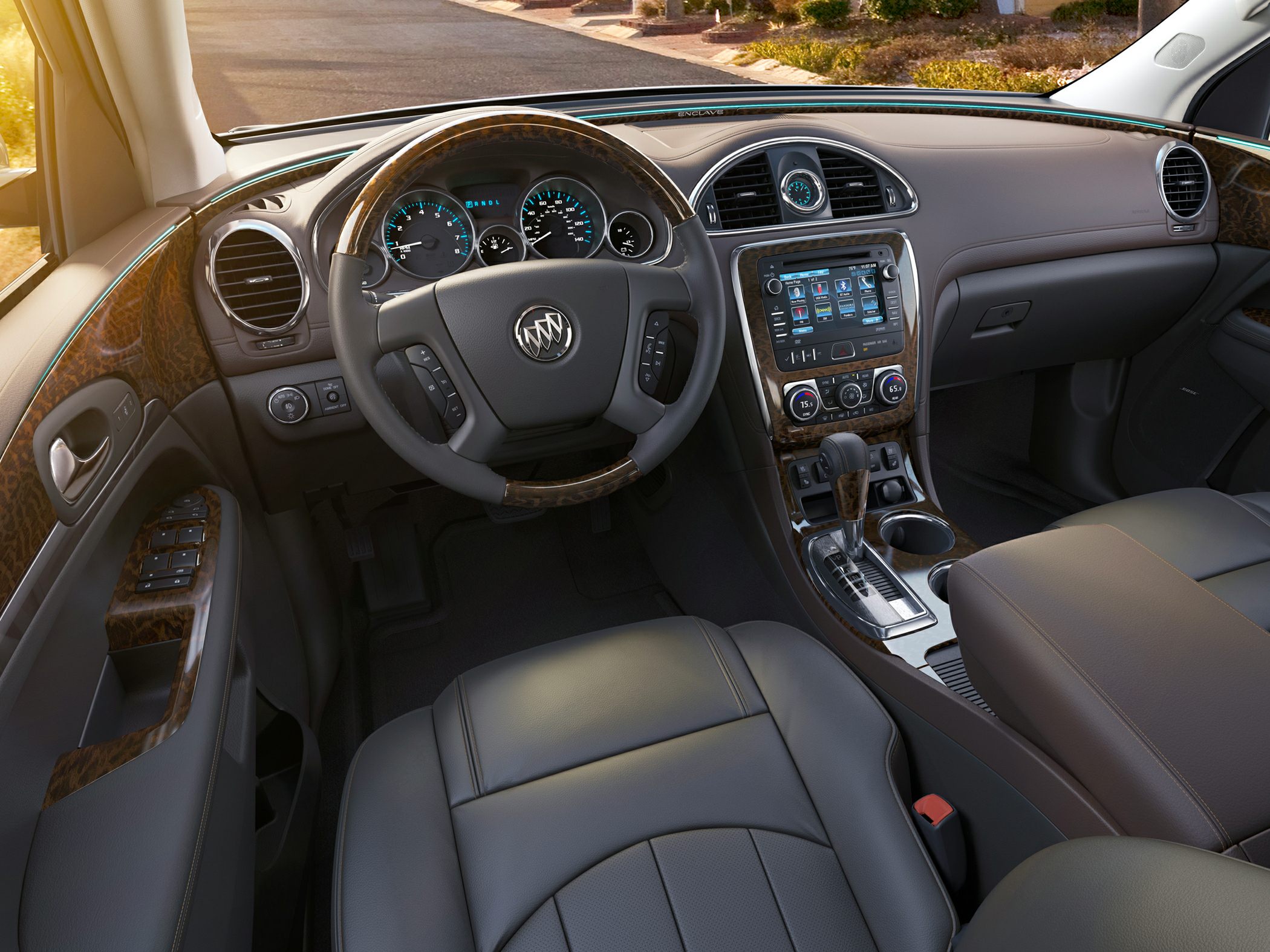 Dashboard wood trim with steering wheel and central control panel
