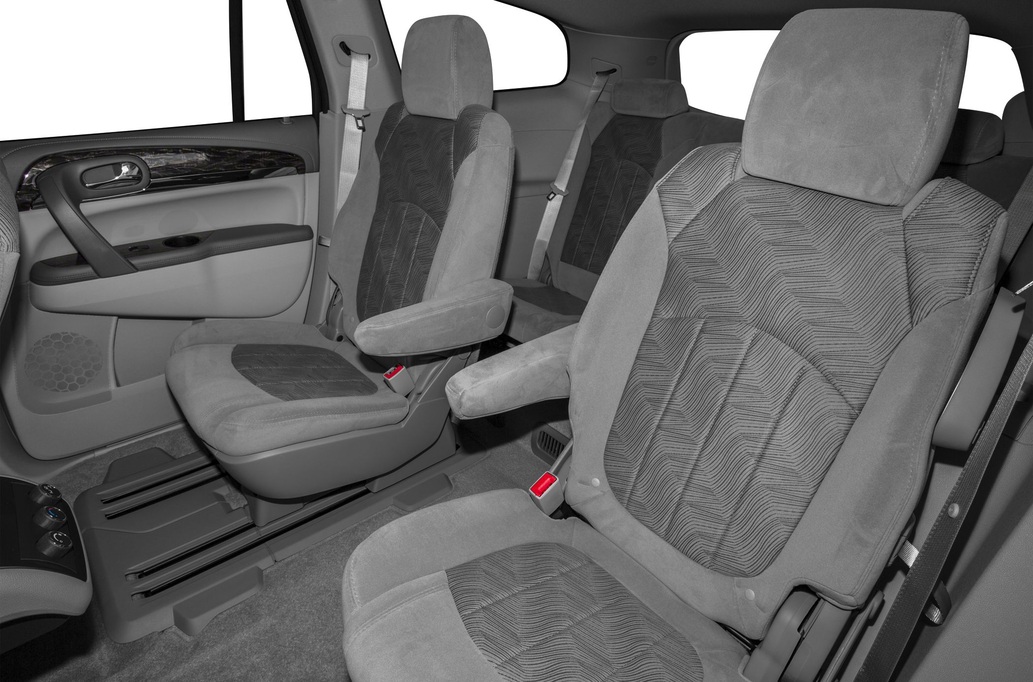 Spacious mid-row seats with armrests and detailed upholstery.