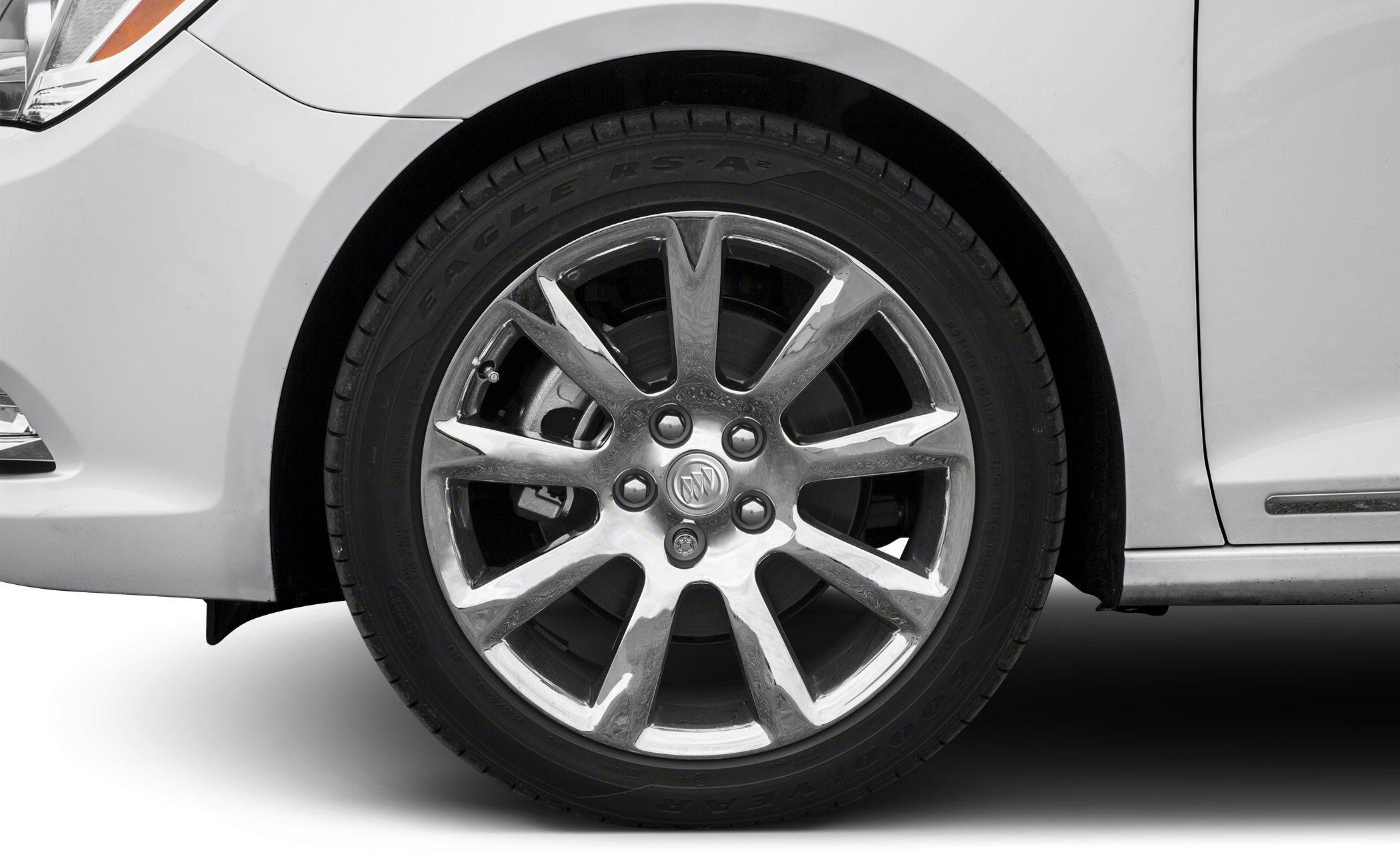 Multi-spoke chrome alloy wheel rim and tire close-up