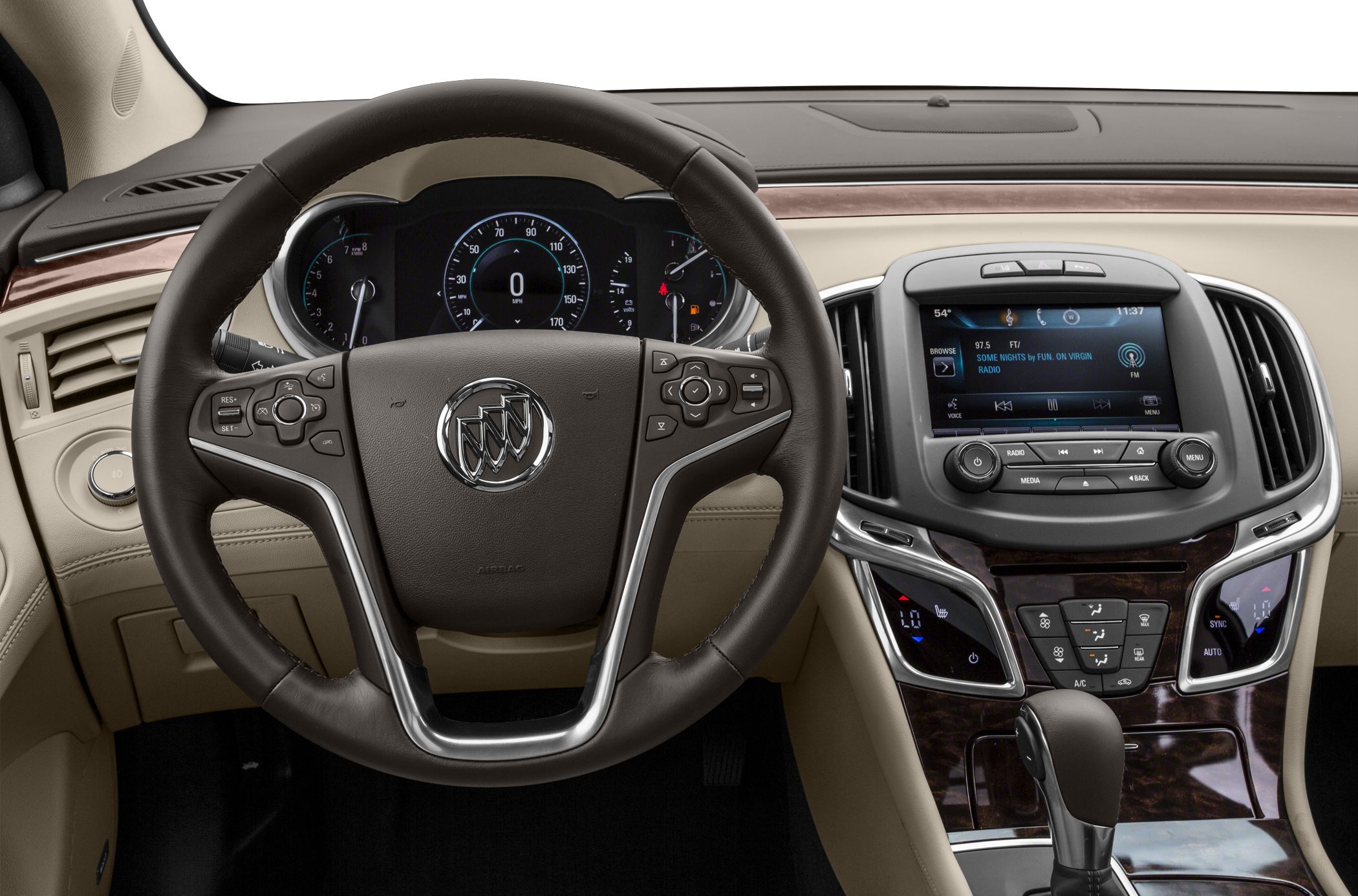 Dashboard, steering wheel with controls, infotainment system, climate and gear shifter