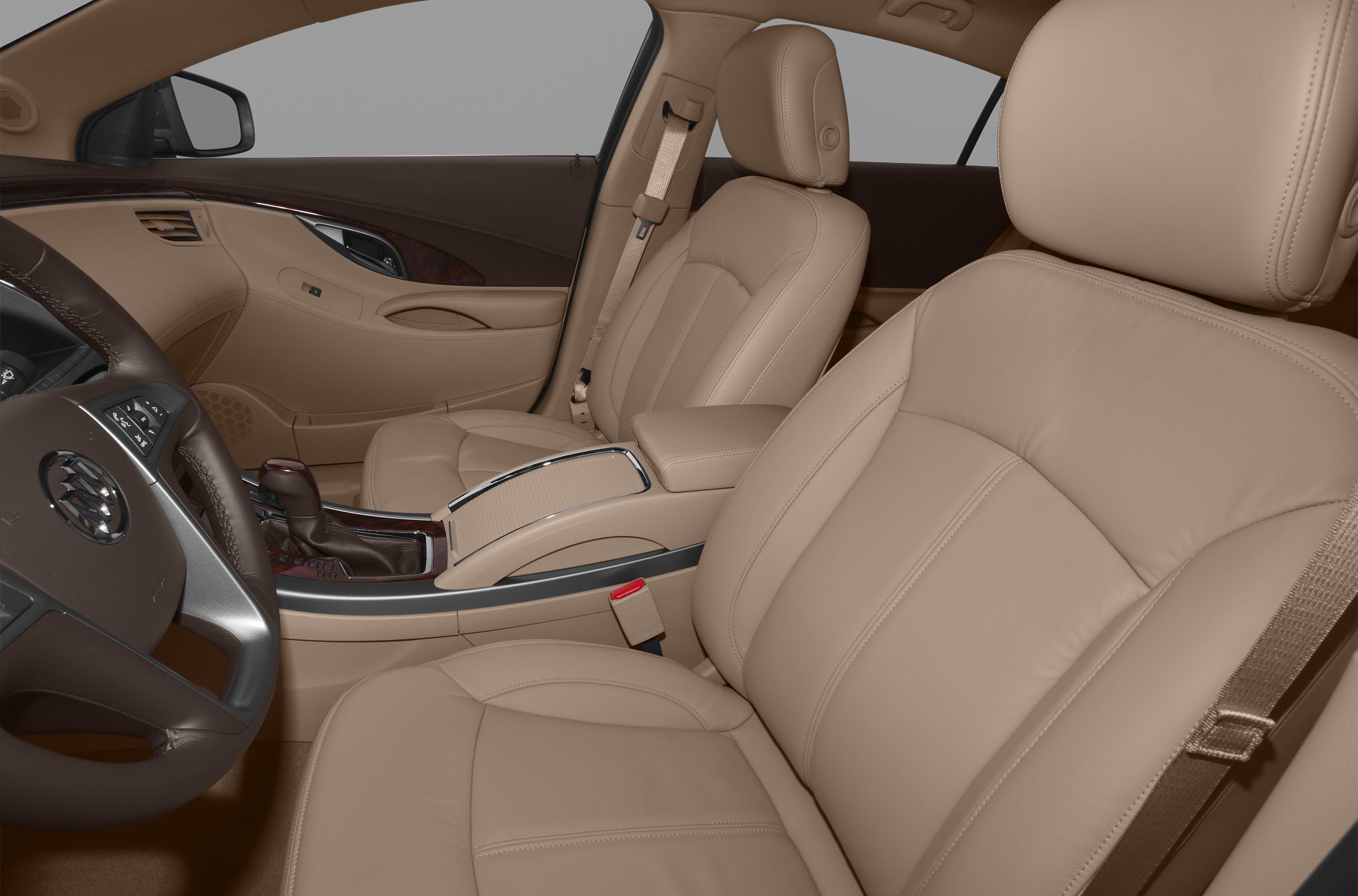 Beige leather front seats with center console and door panel