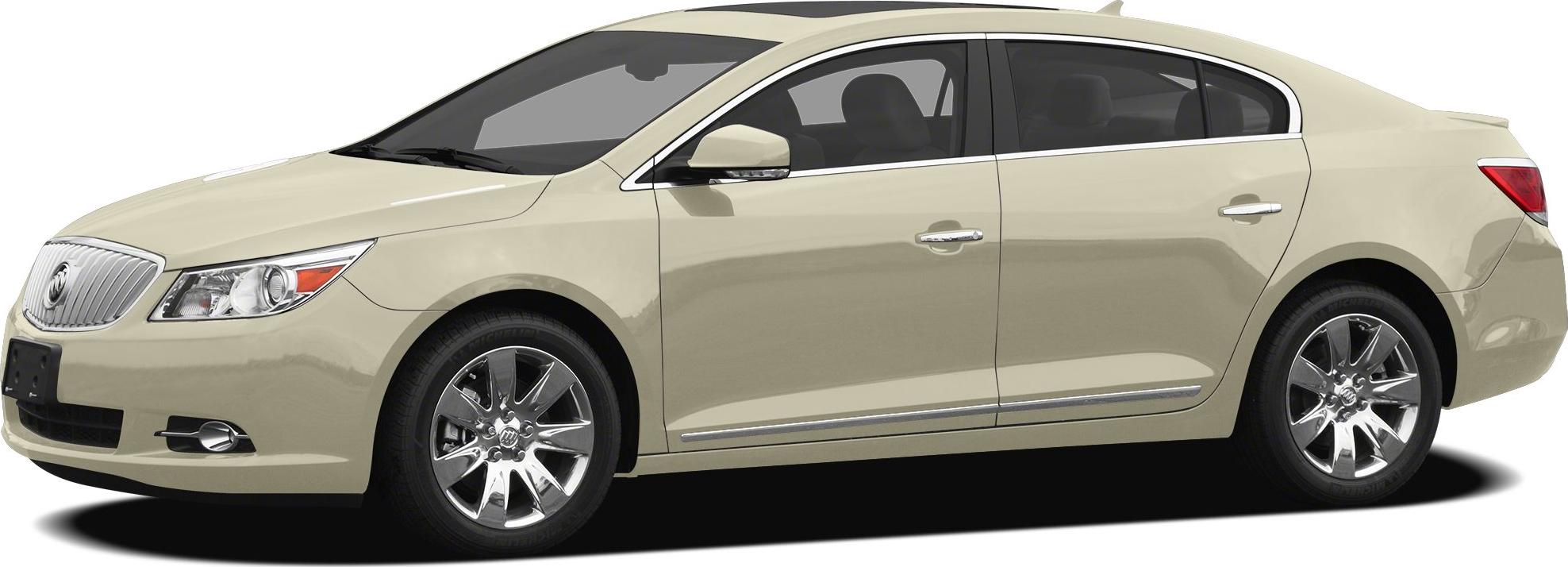 Side profile of beige sedan with chrome wheels and smooth body lines