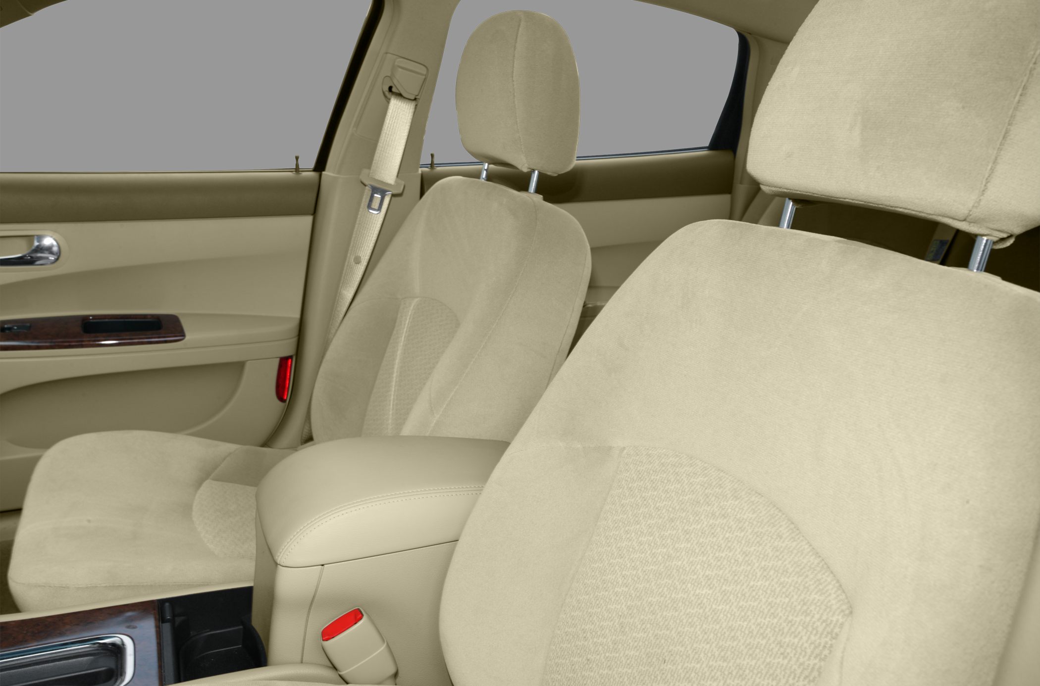 Beige fabric front seats with headrests and door panel detail