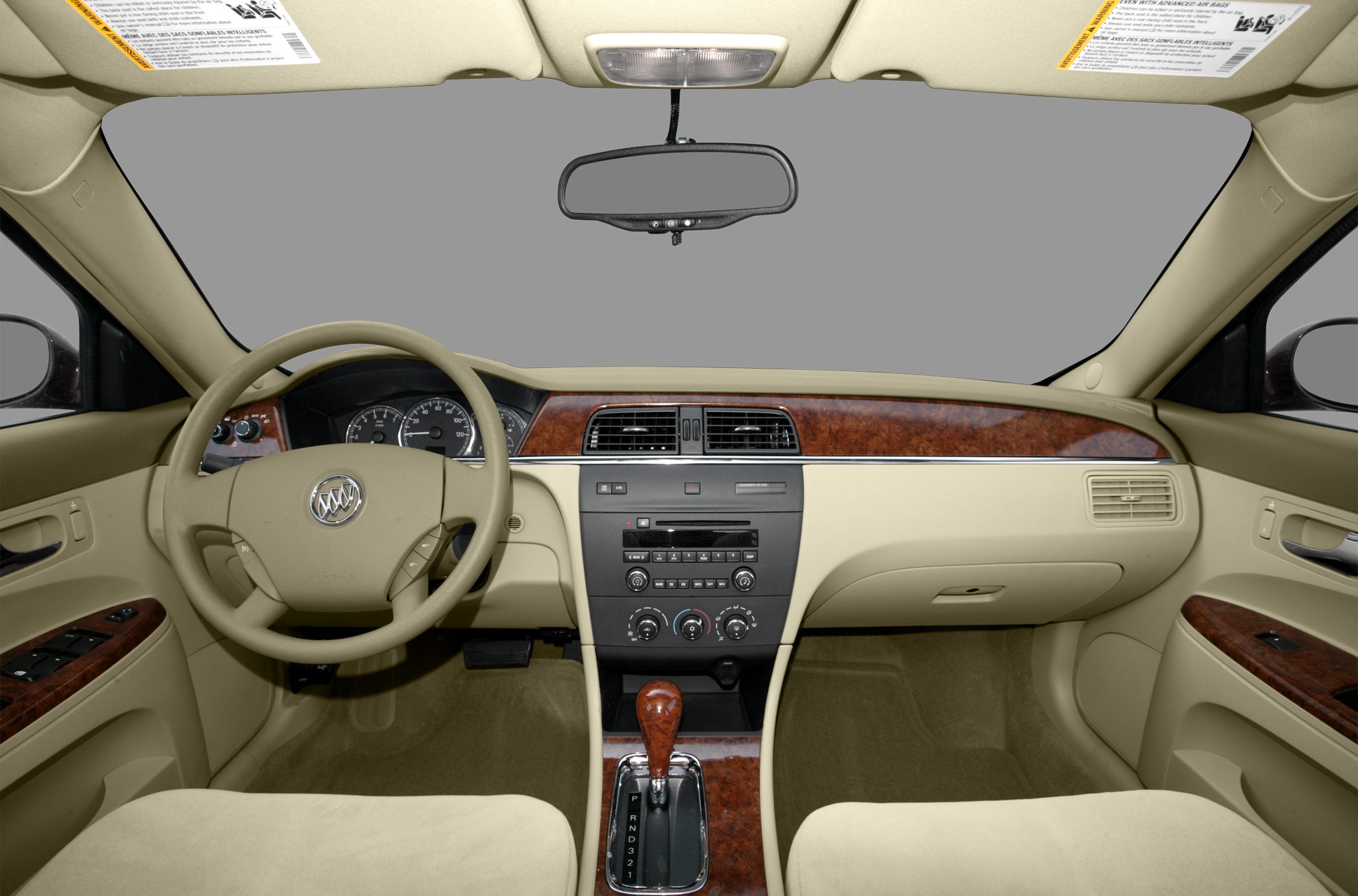 Dashboard and steering wheel with wood trim and center console controls