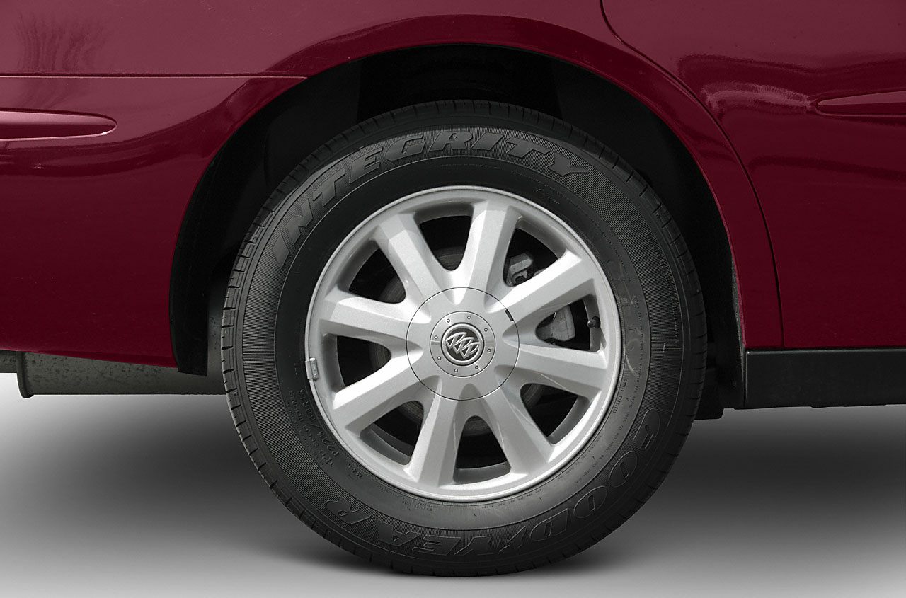 Alloy wheel with multi-spoke rim and Goodyear Integrity tire close-up