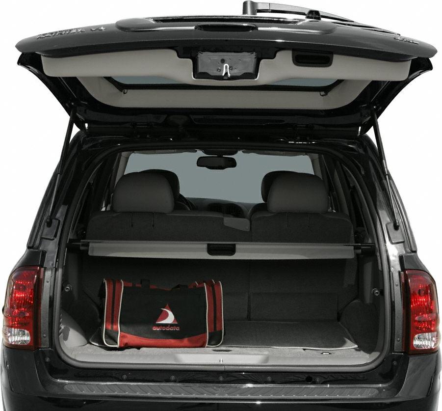 Open rear cargo space with red-black sports bag inside trunk