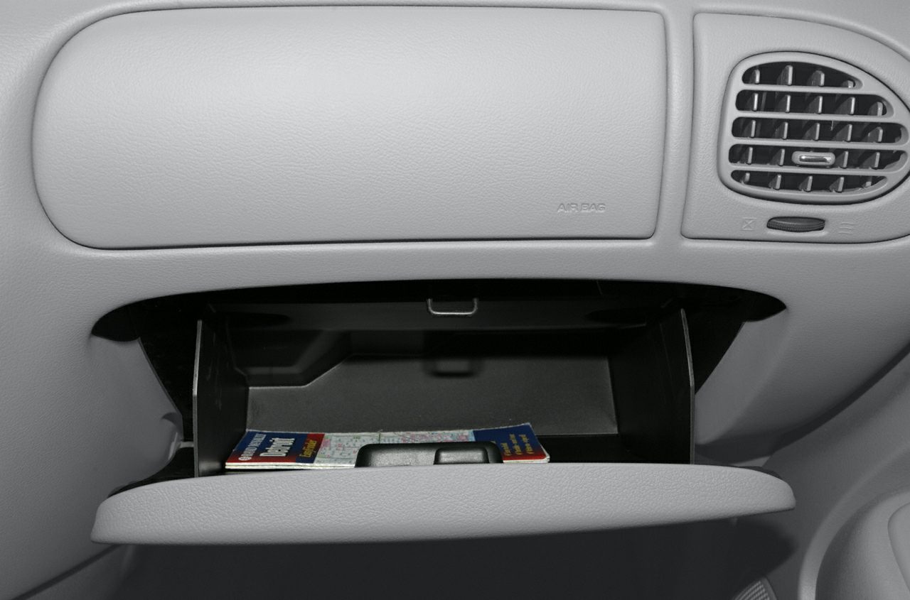 Open glove compartment and dashboard air vent