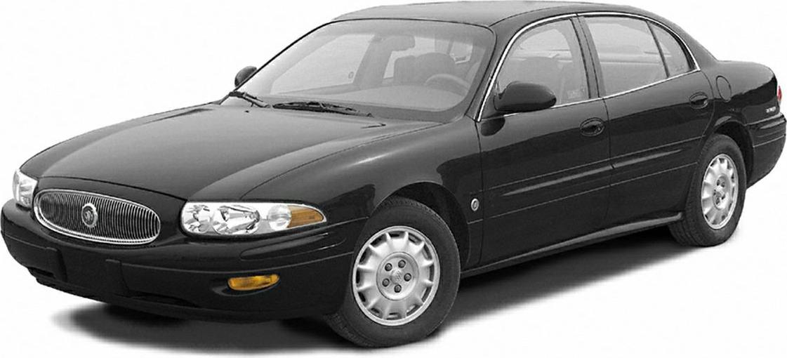Front side view of a sedan with classic grille and headlights