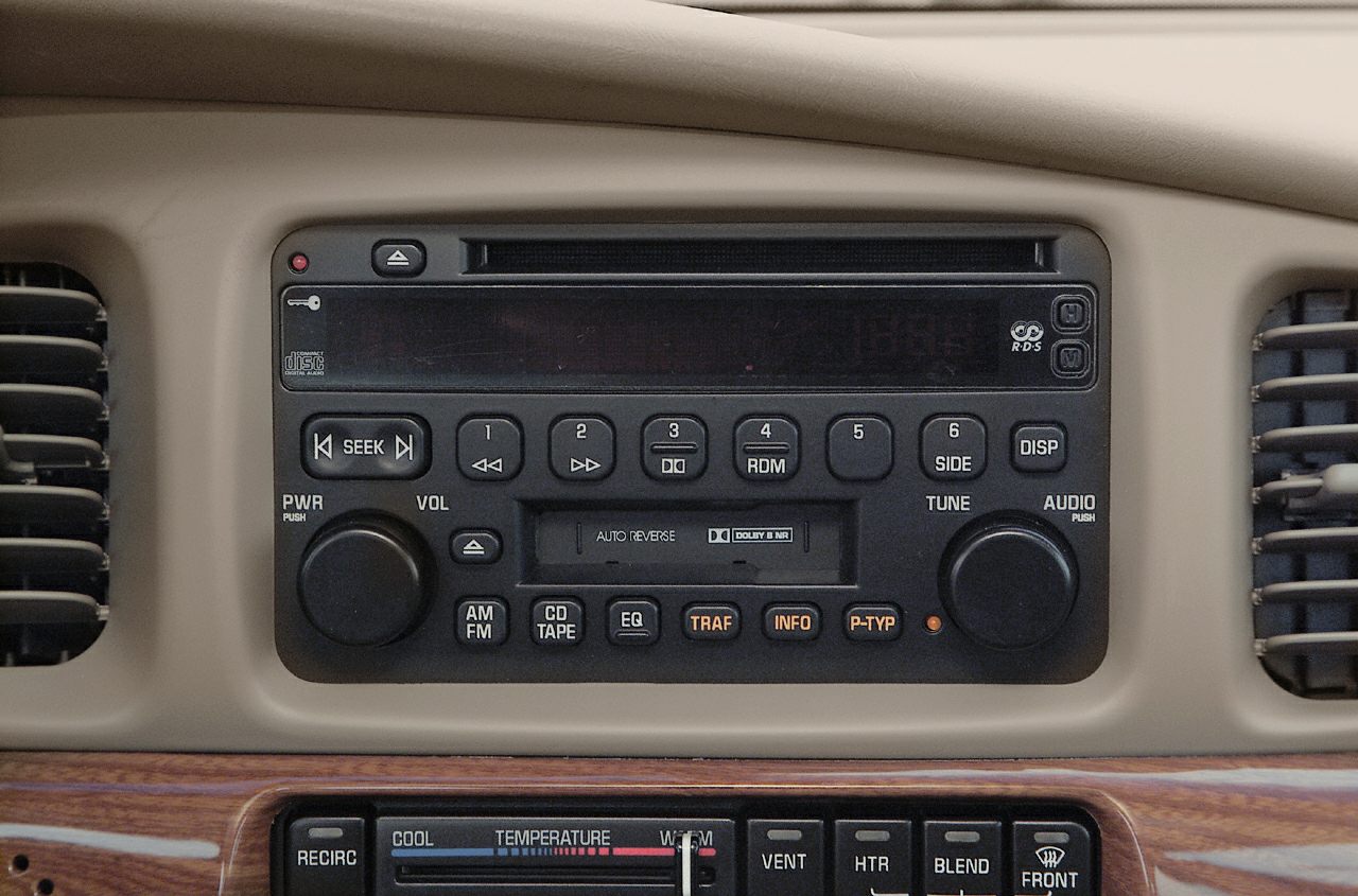 Car stereo system with tape deck and radio controls