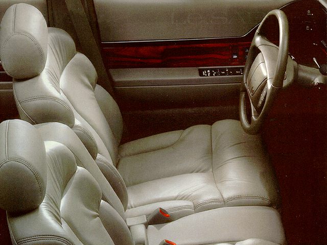 Leather seats and steering wheel with power window controls