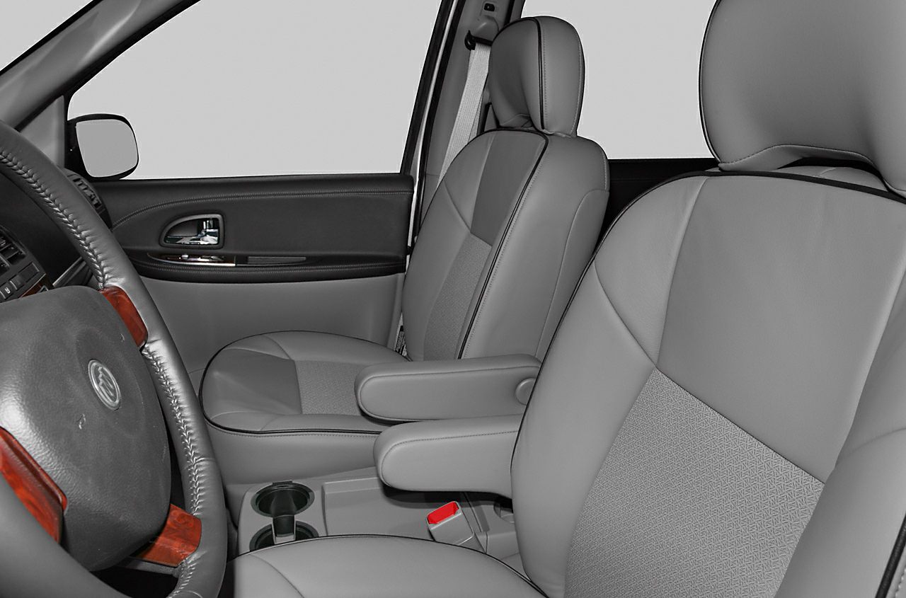 Front seats with armrests and steering wheel close-up
