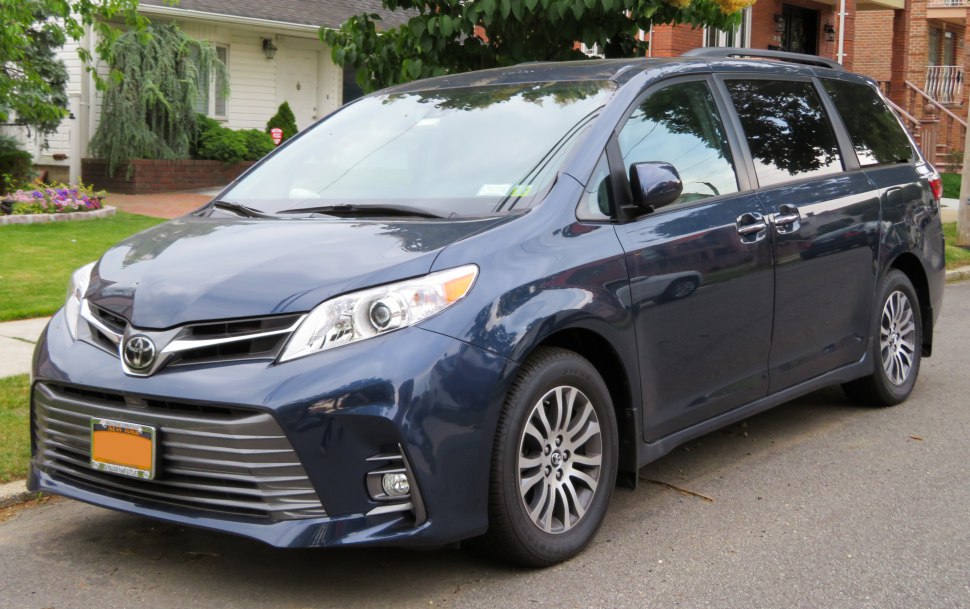 Front-side view of a minivan with updated headlights and grille