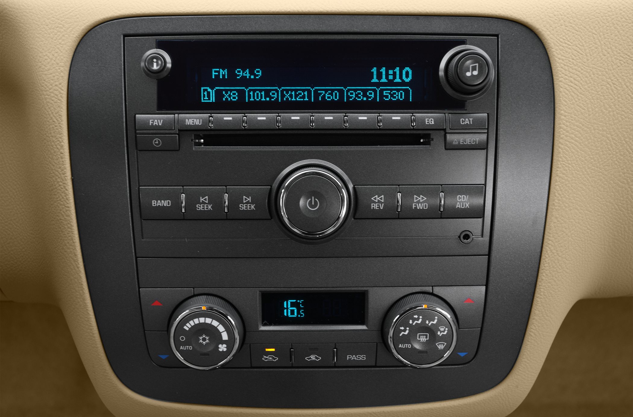 Car radio and climate control interface with digital display and control knobs