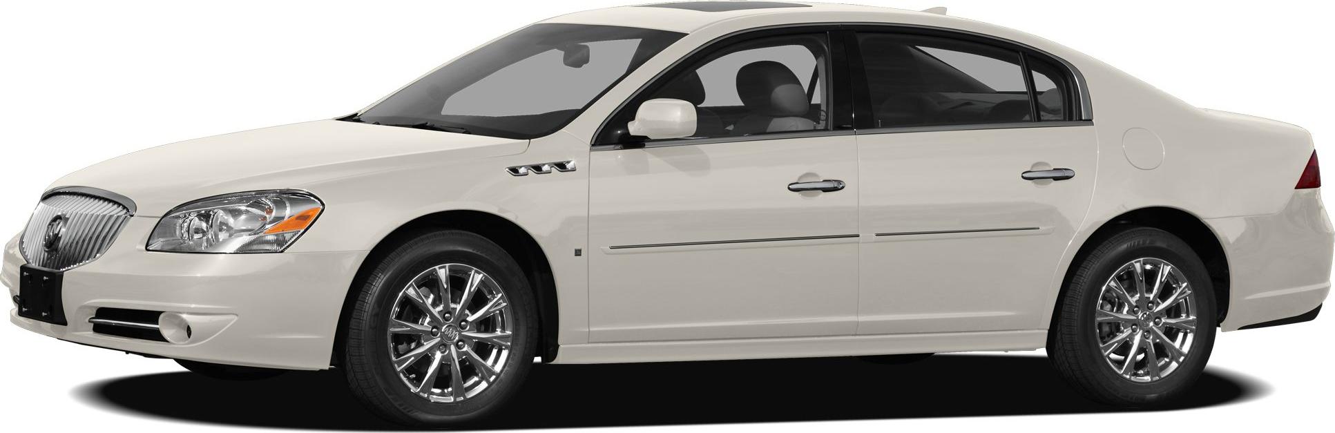 Side view with chrome wheels and vent details on white sedan