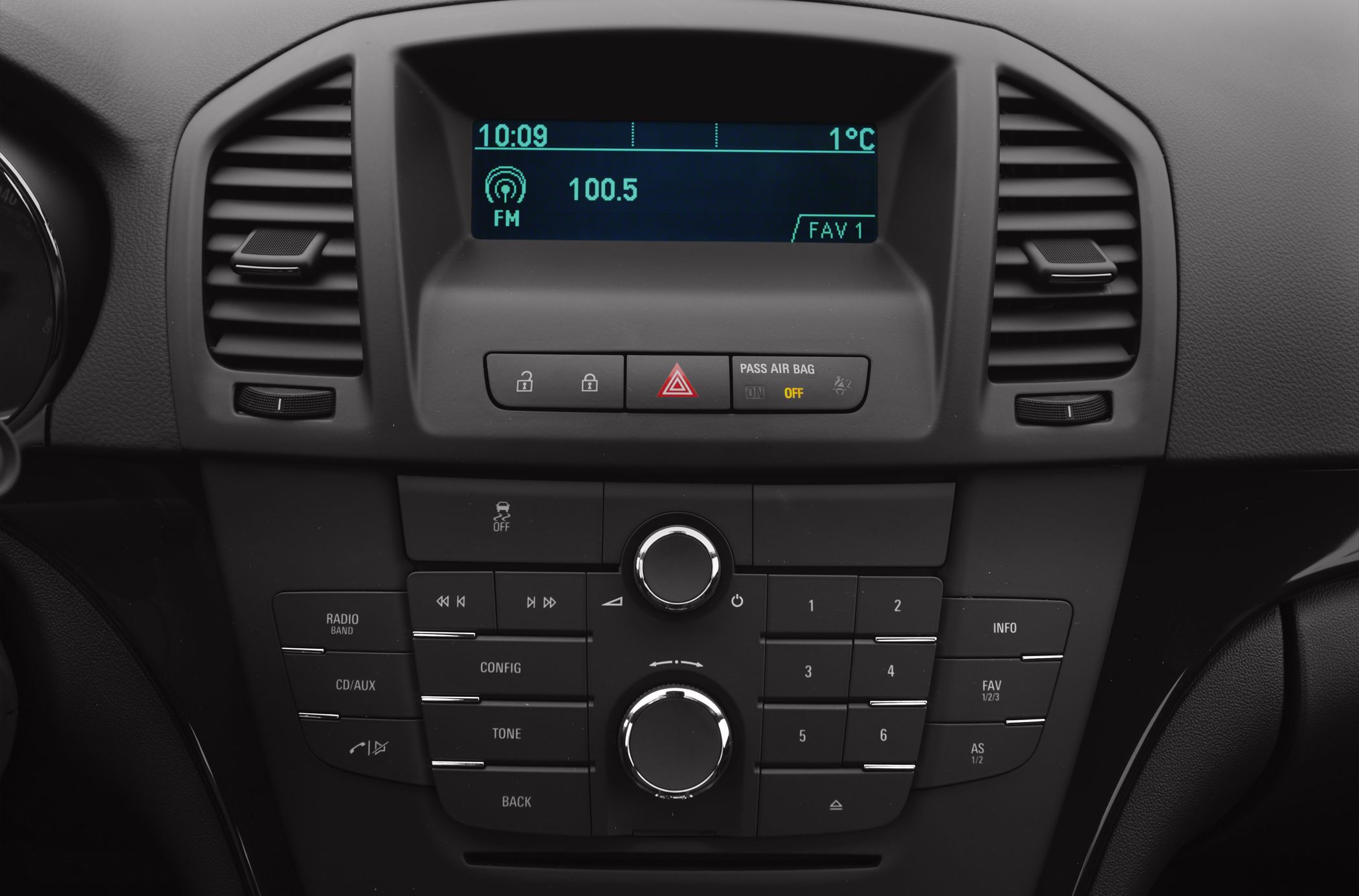 Car center console with radio controls and digital display screen