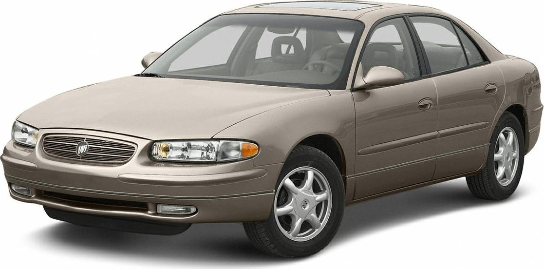 Four-door sedan with rounded headlights and classic alloy wheels.