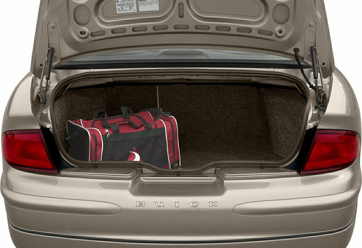 Open trunk with luggage inside showing spacious cargo area
