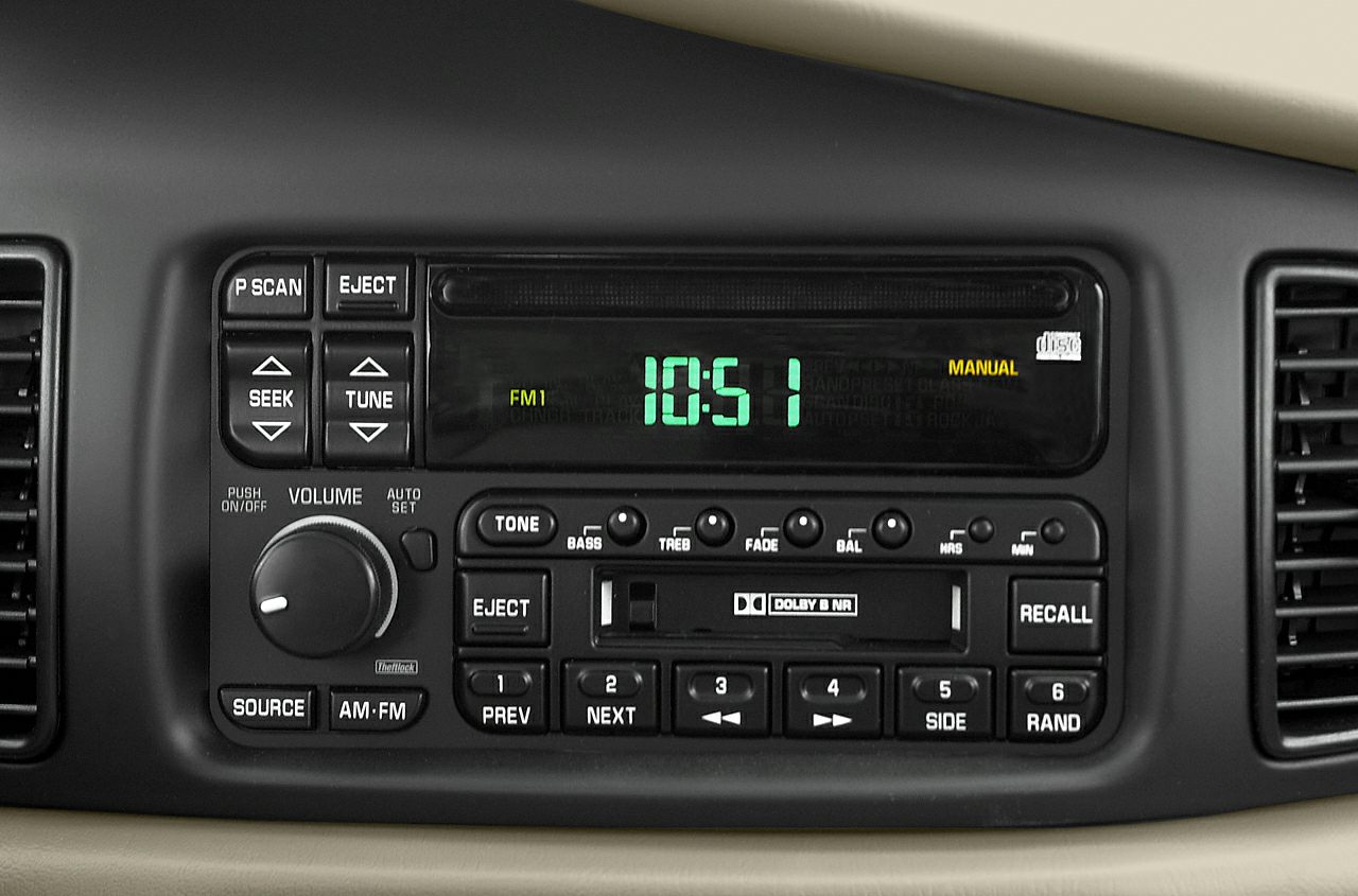 Classic car radio and cassette player with manual tuning and audio controls