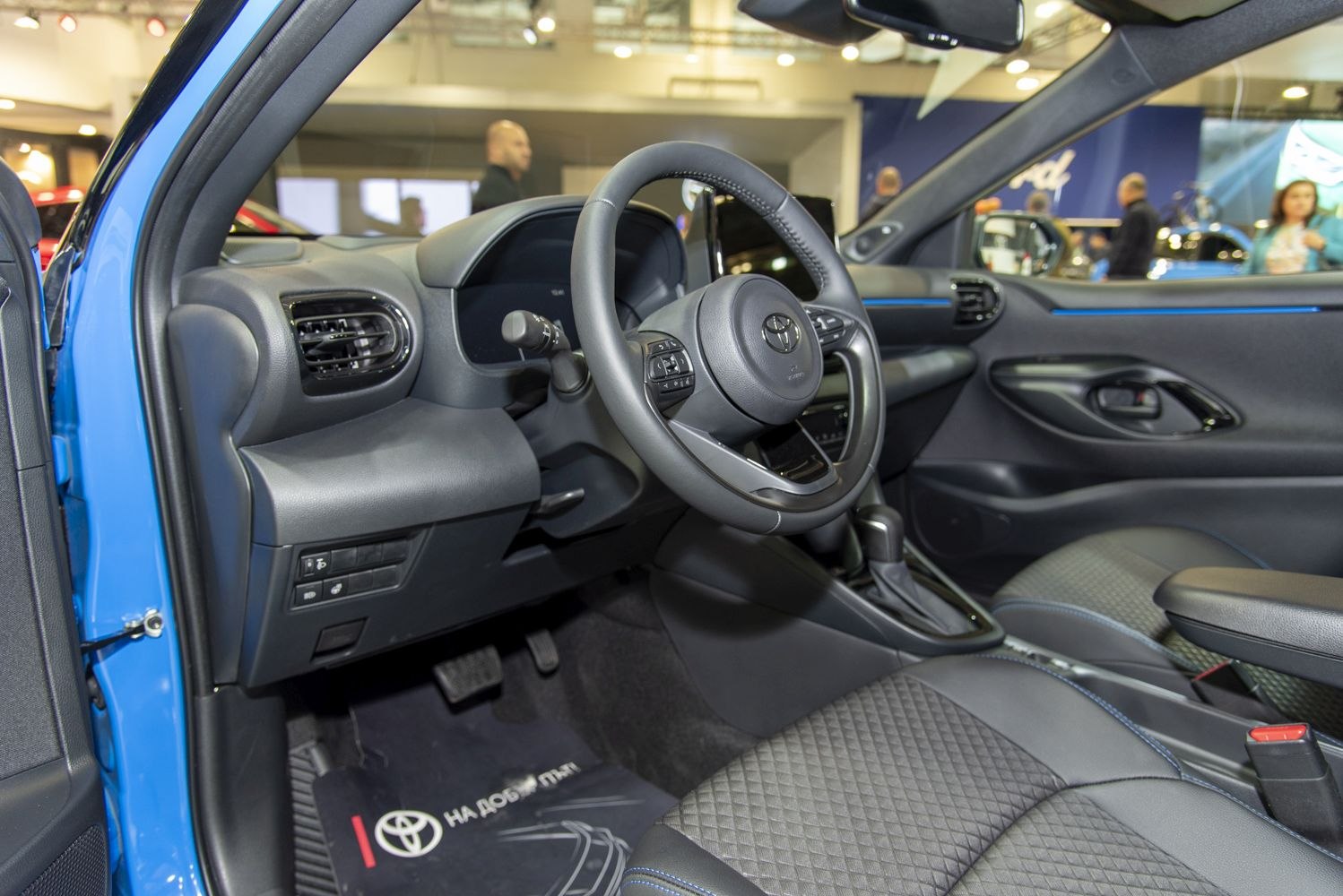 Steering wheel and dashboard inside modern compact car