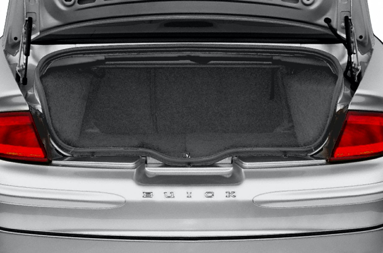 Open sedan trunk showing empty cargo space