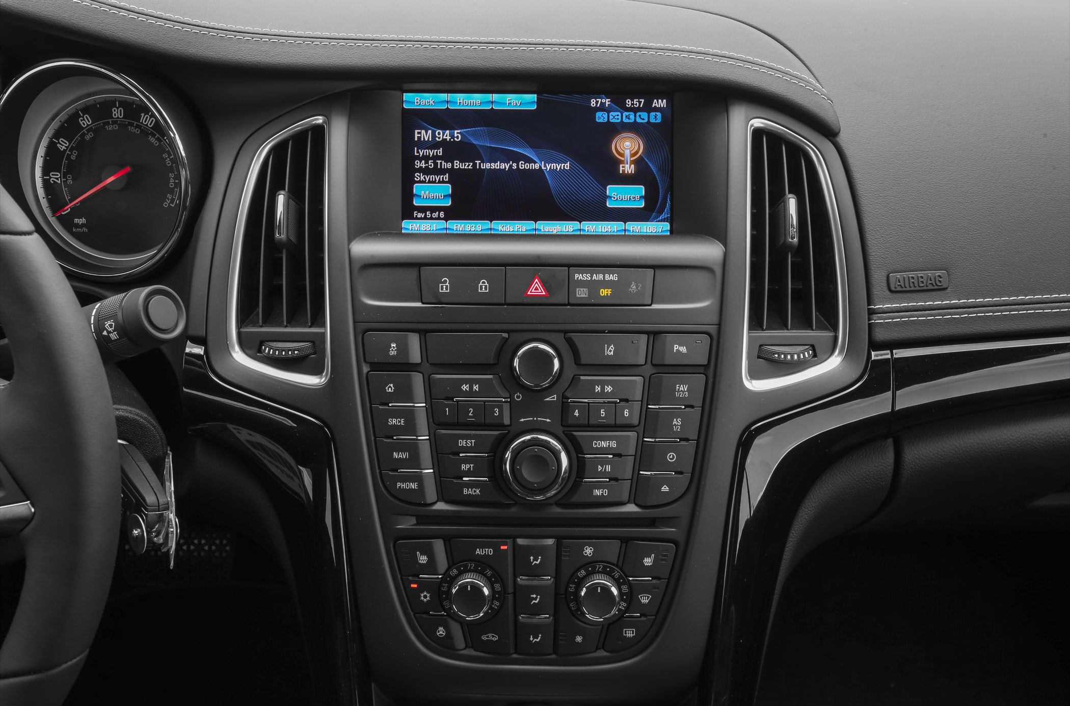 Dashboard multimedia control panel with infotainment screen and climate controls