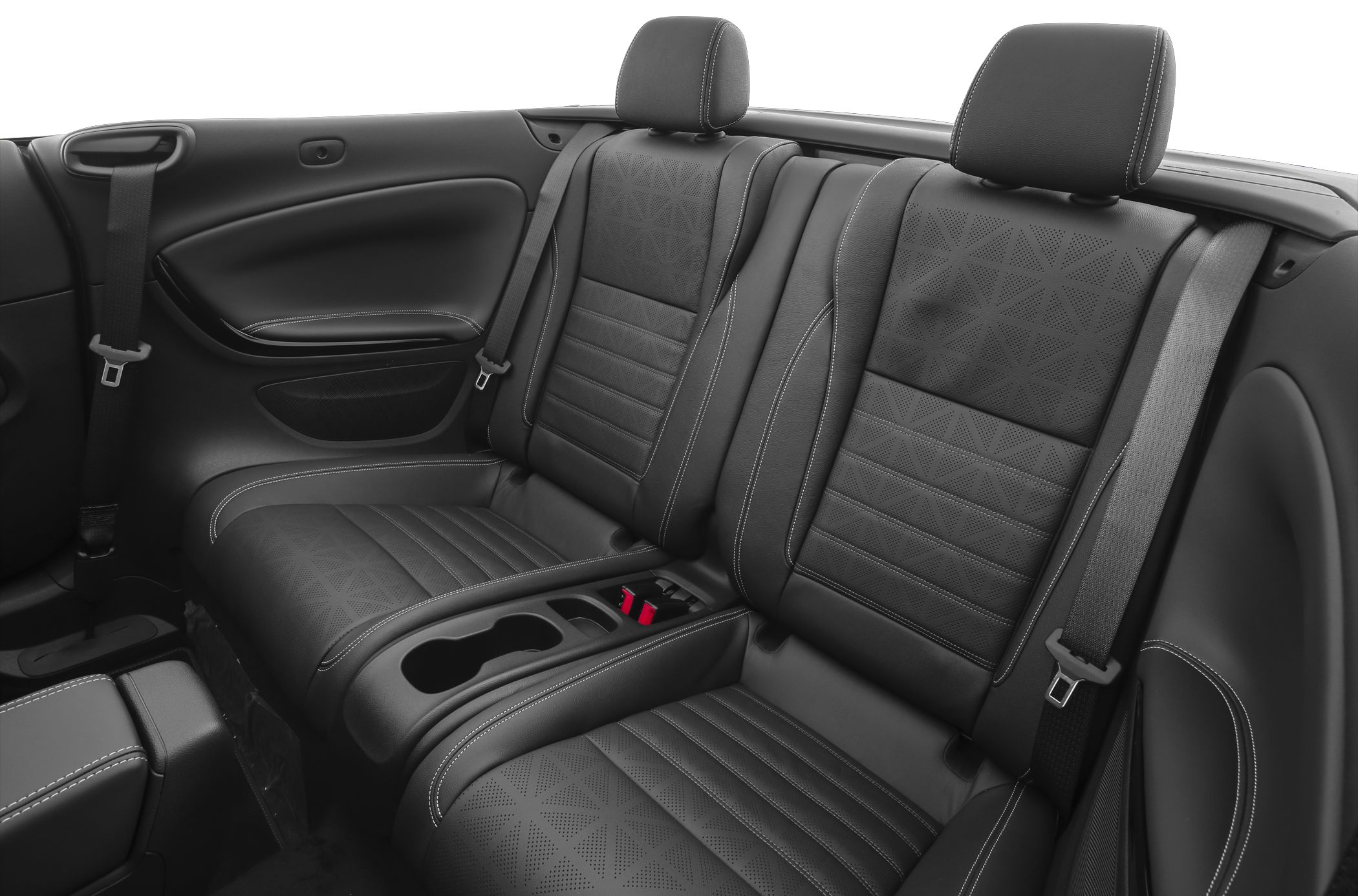 Black leather rear seats with patterned upholstery and cup holders