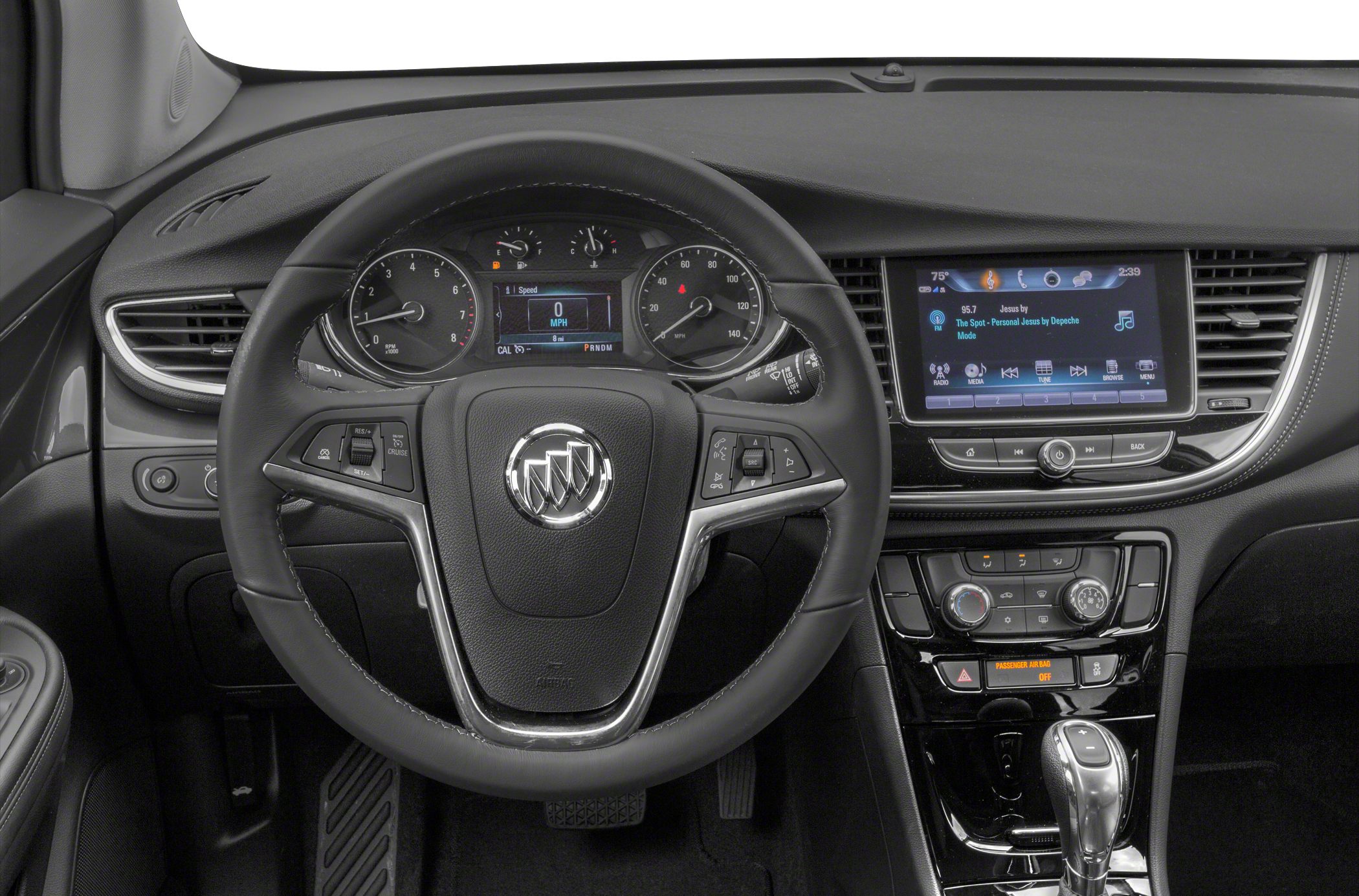 Car interior: steering wheel, dashboard, infotainment screen