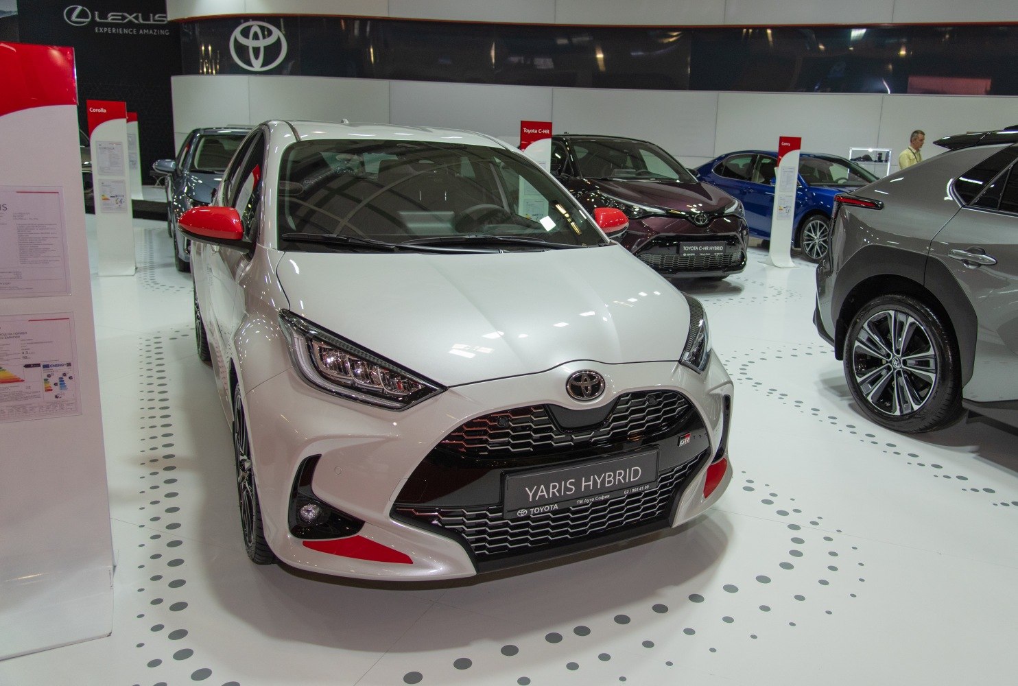 Sporty front view, aggressive grille, angular headlights