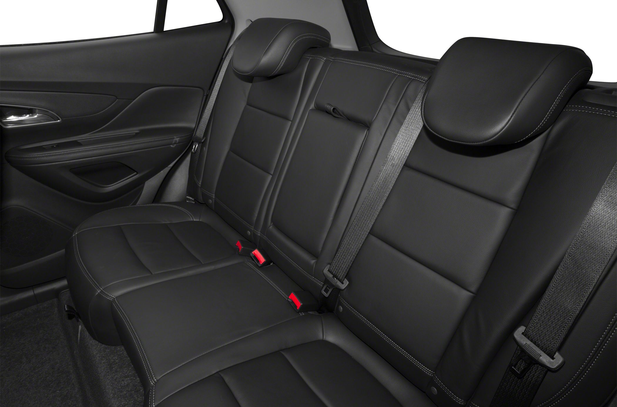 Black leather rear seats with white stitching and seat belts