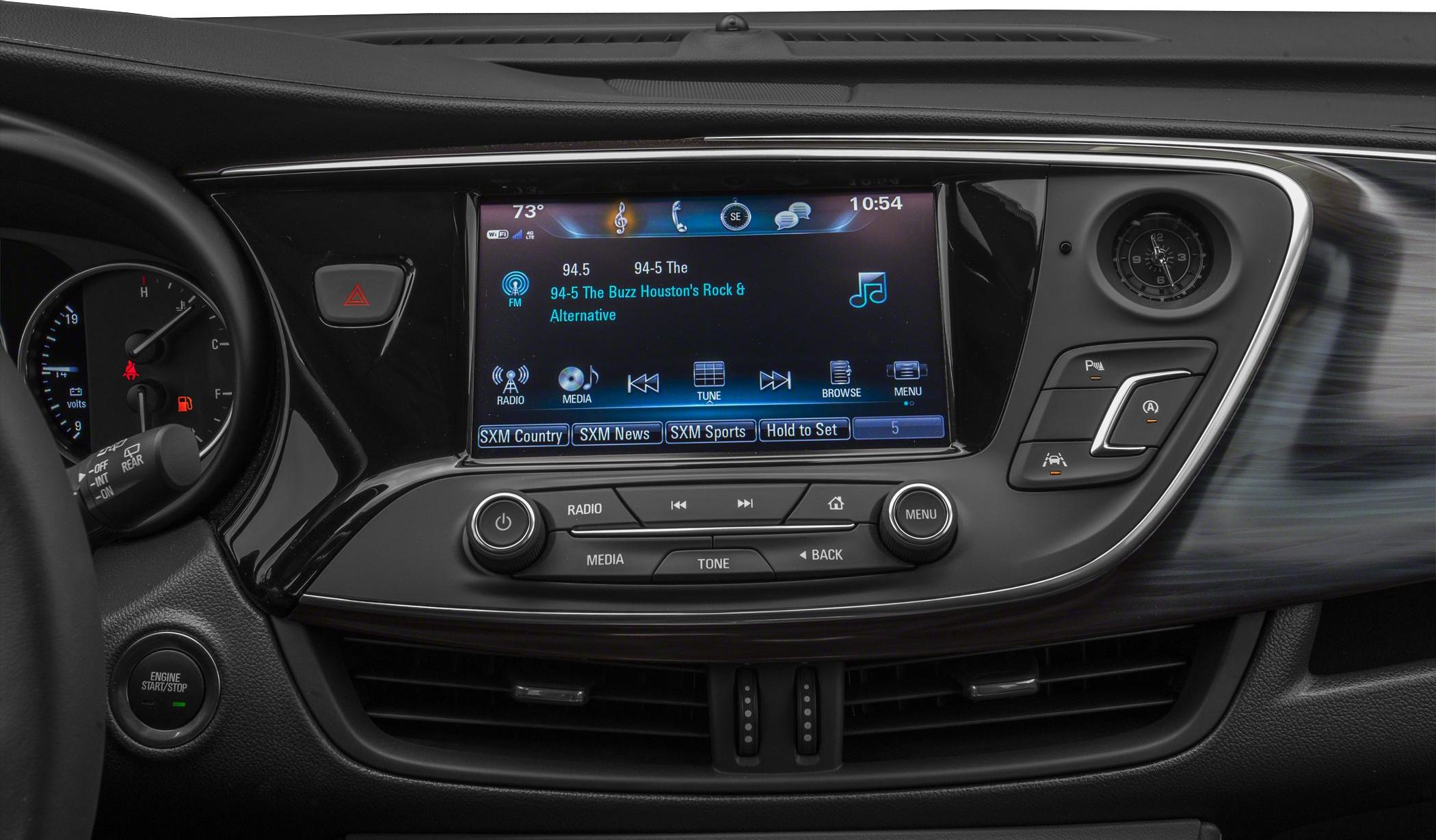 Infotainment touchscreen with radio controls and dashboard buttons