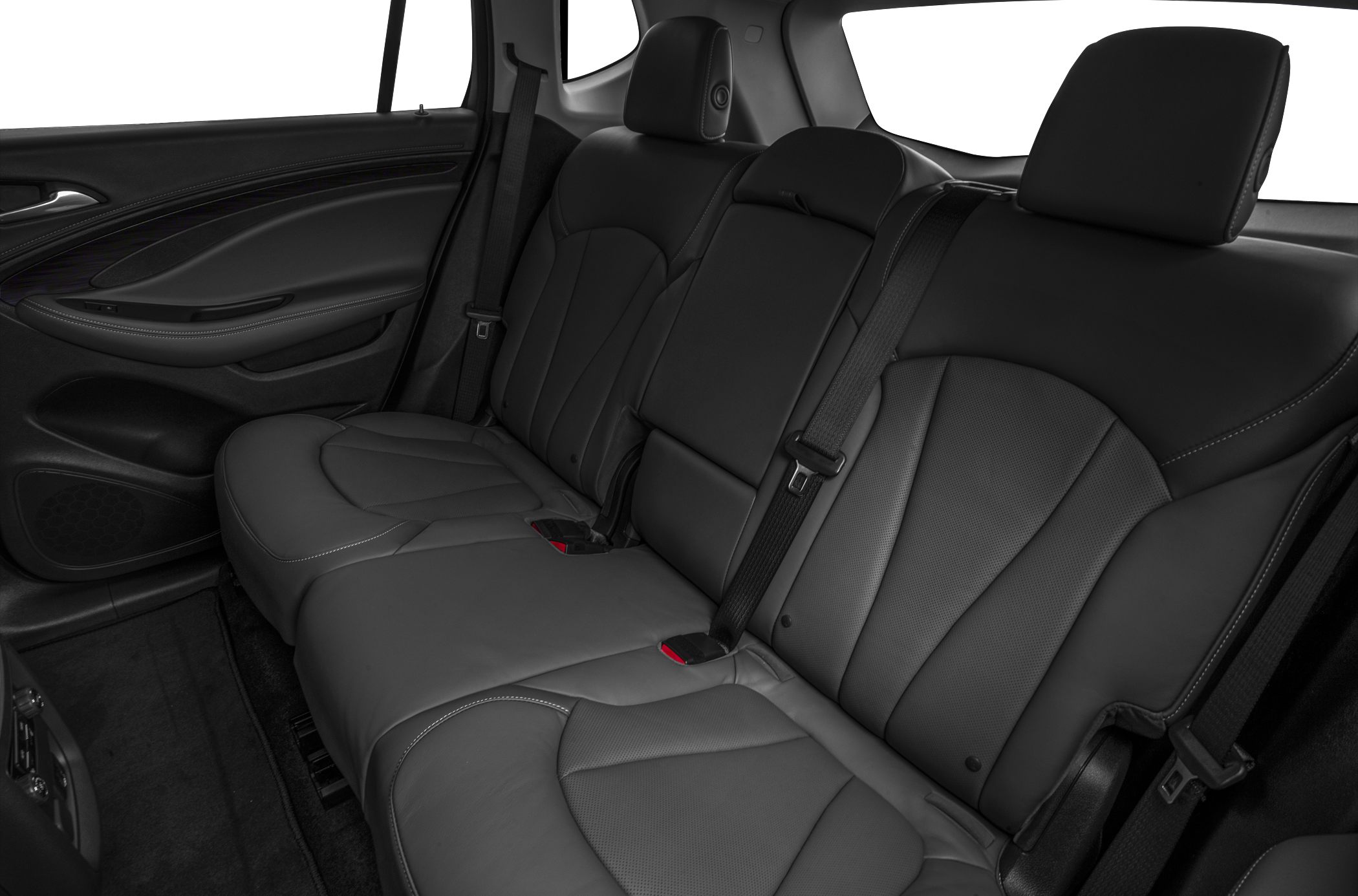 Rear leather seats with detailed stitching and seat belts