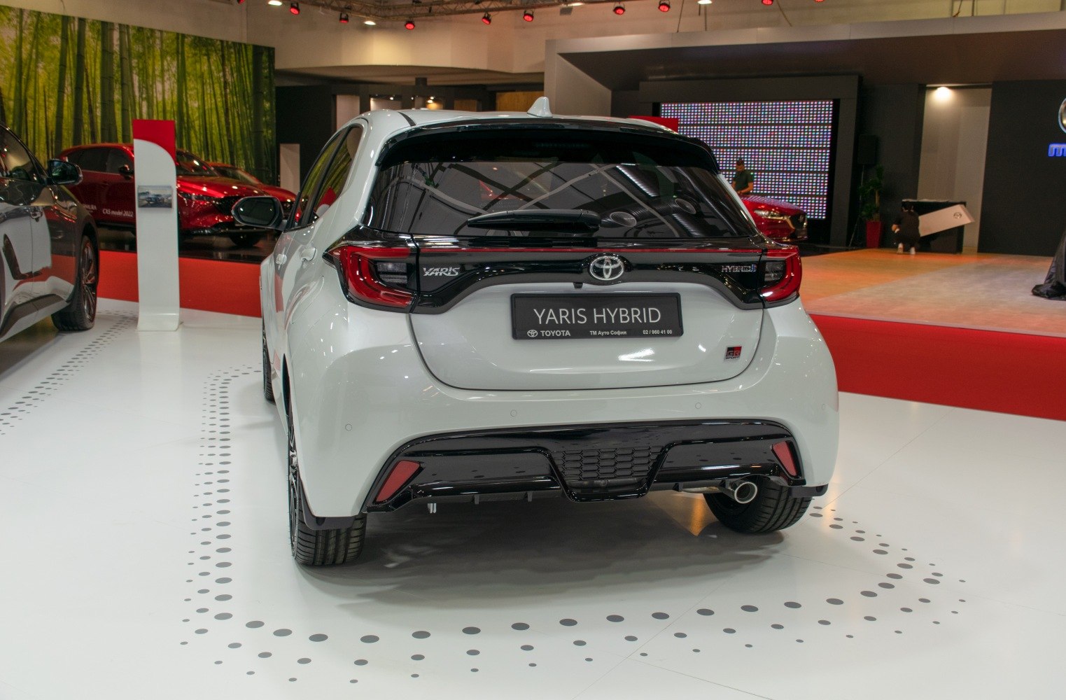 Rear view of a compact hatchback with sleek LED tail lights and sporty bumper