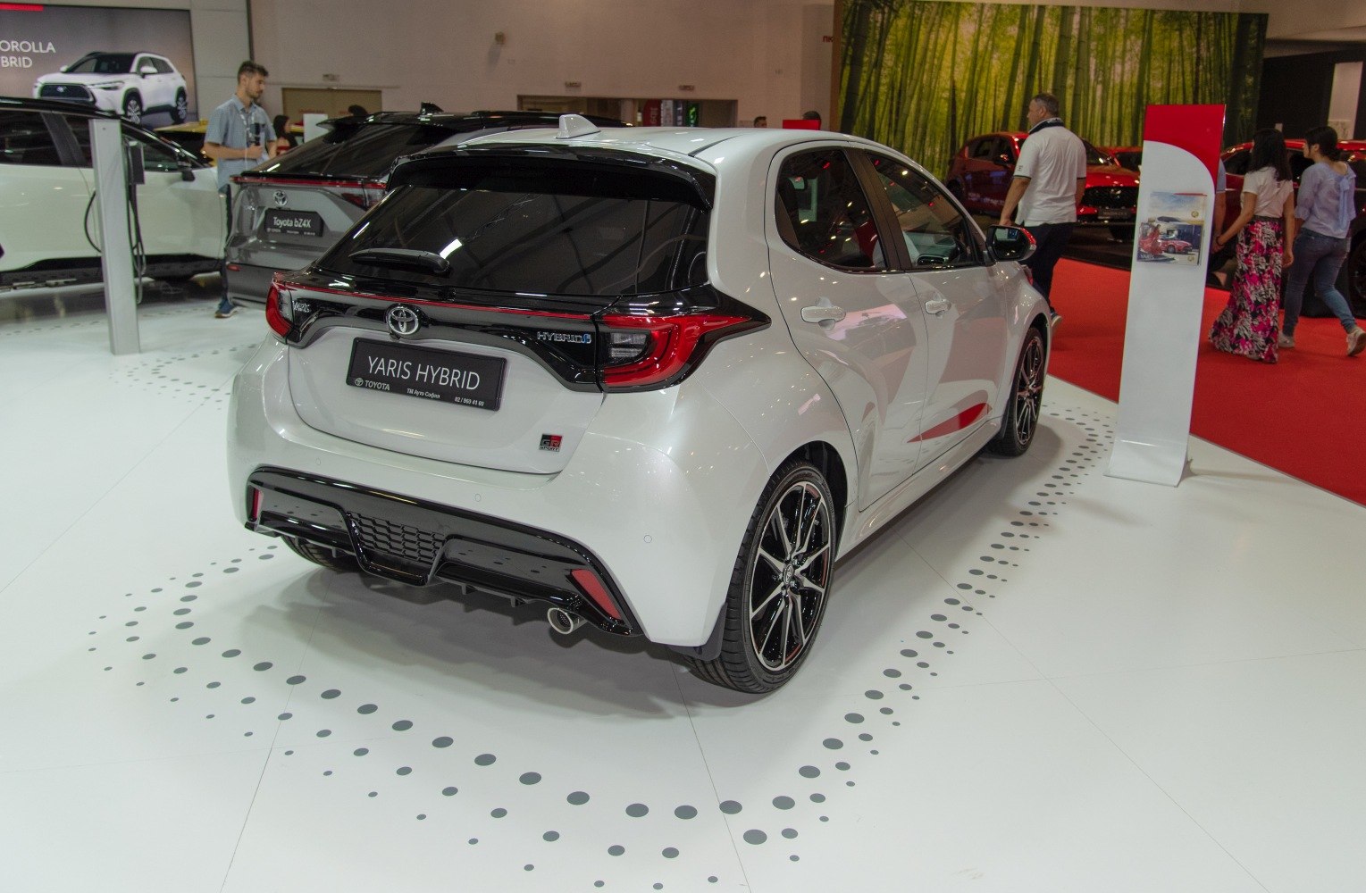 Rear view of hybrid hatchback with sporty diffuser and distinctive taillights