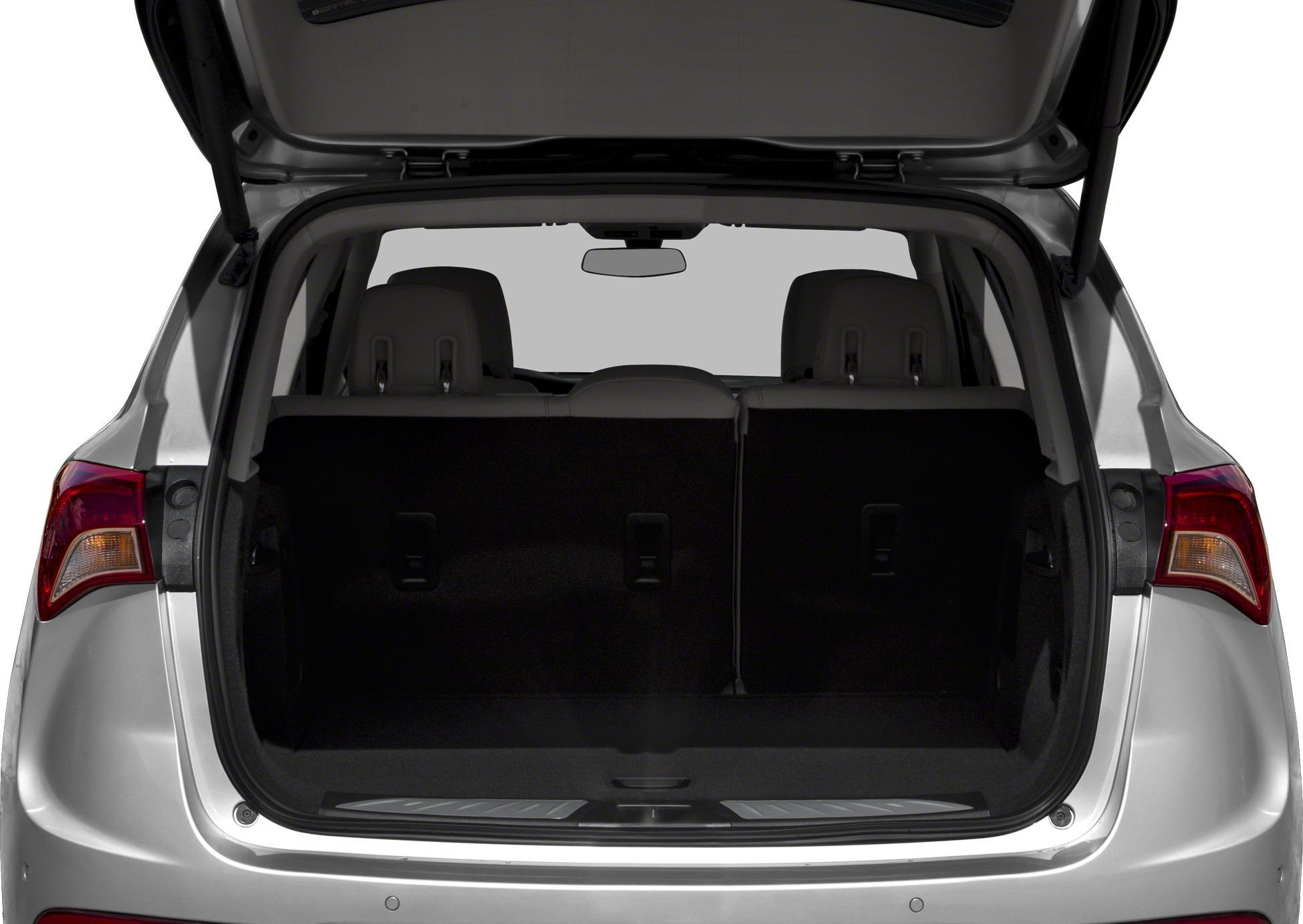 Open rear cargo space with rear seats and headrests visible